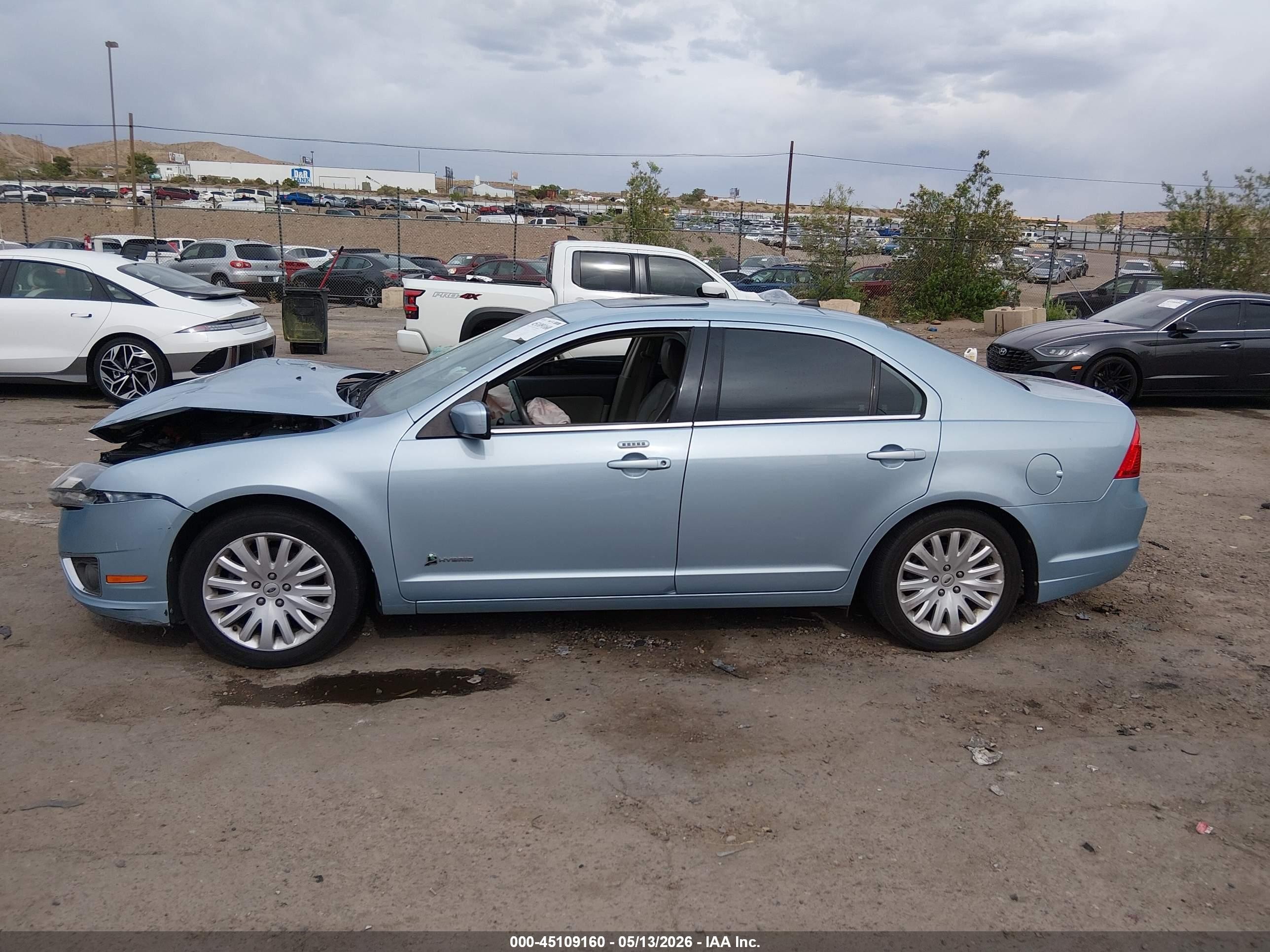 2010 Ford Fusion Hybrid   Light Blue vin: 3FADP0L37AR270773