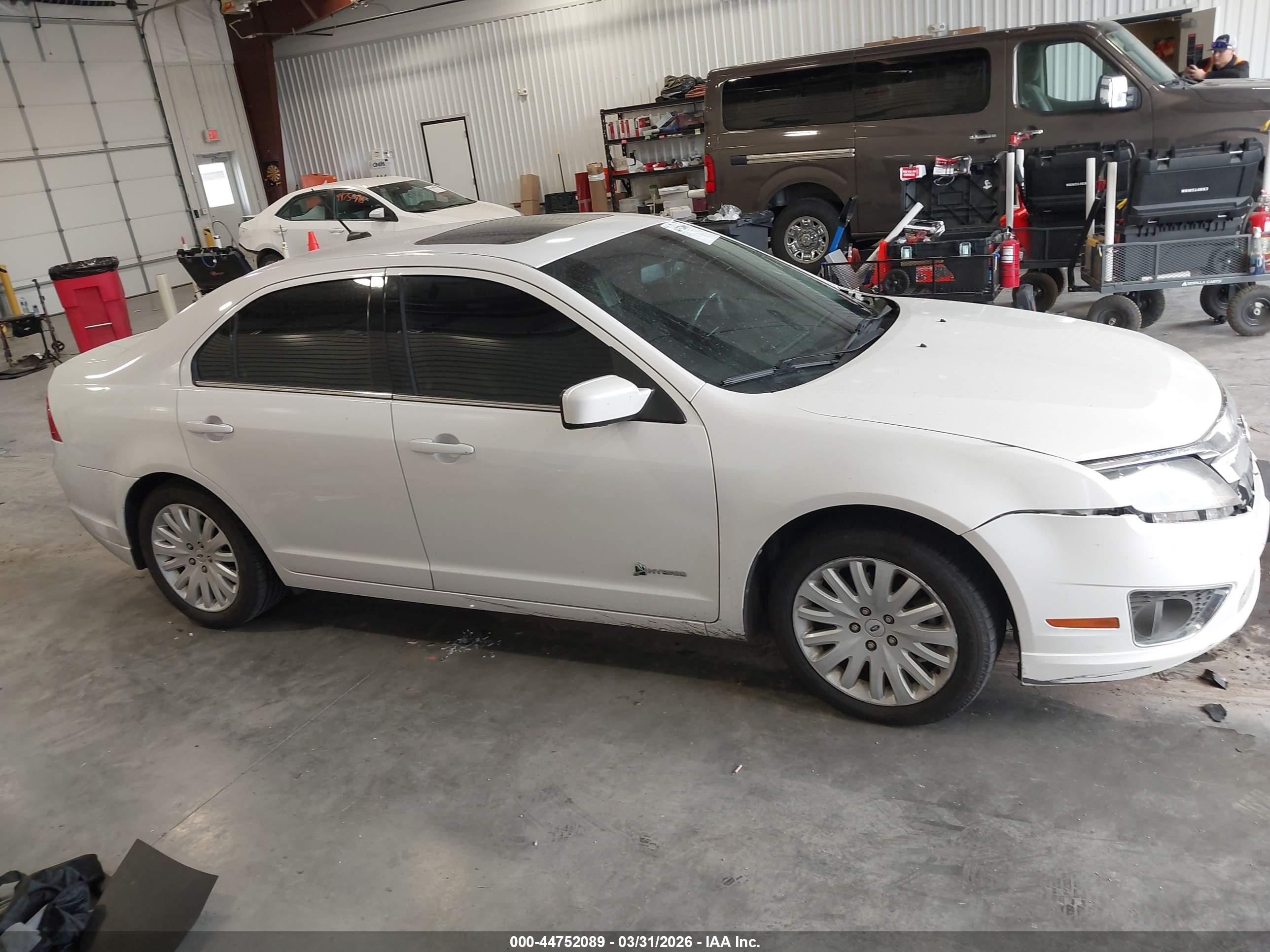 2010 Ford Fusion Hybrid   White vin: 3FADP0L37AR403127