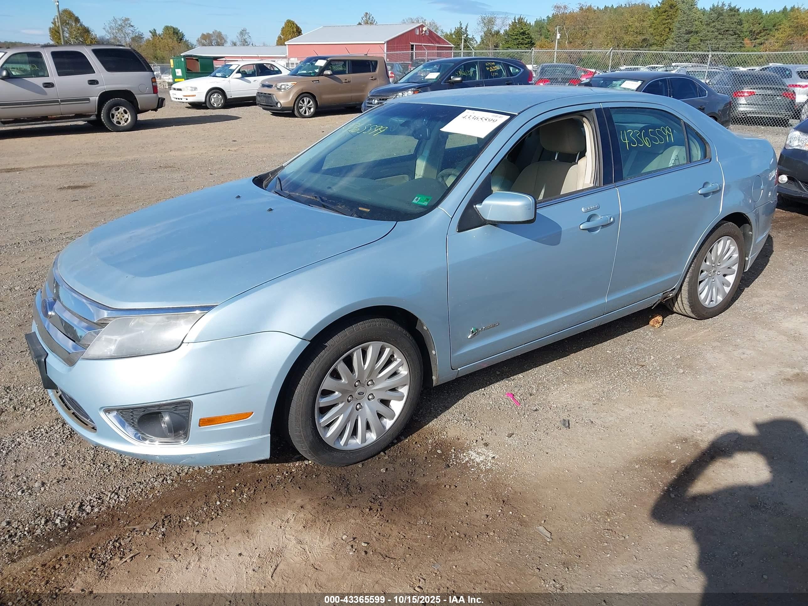 2010 Ford Fusion Hybrid   Blue vin: 3FADP0L38AR148195