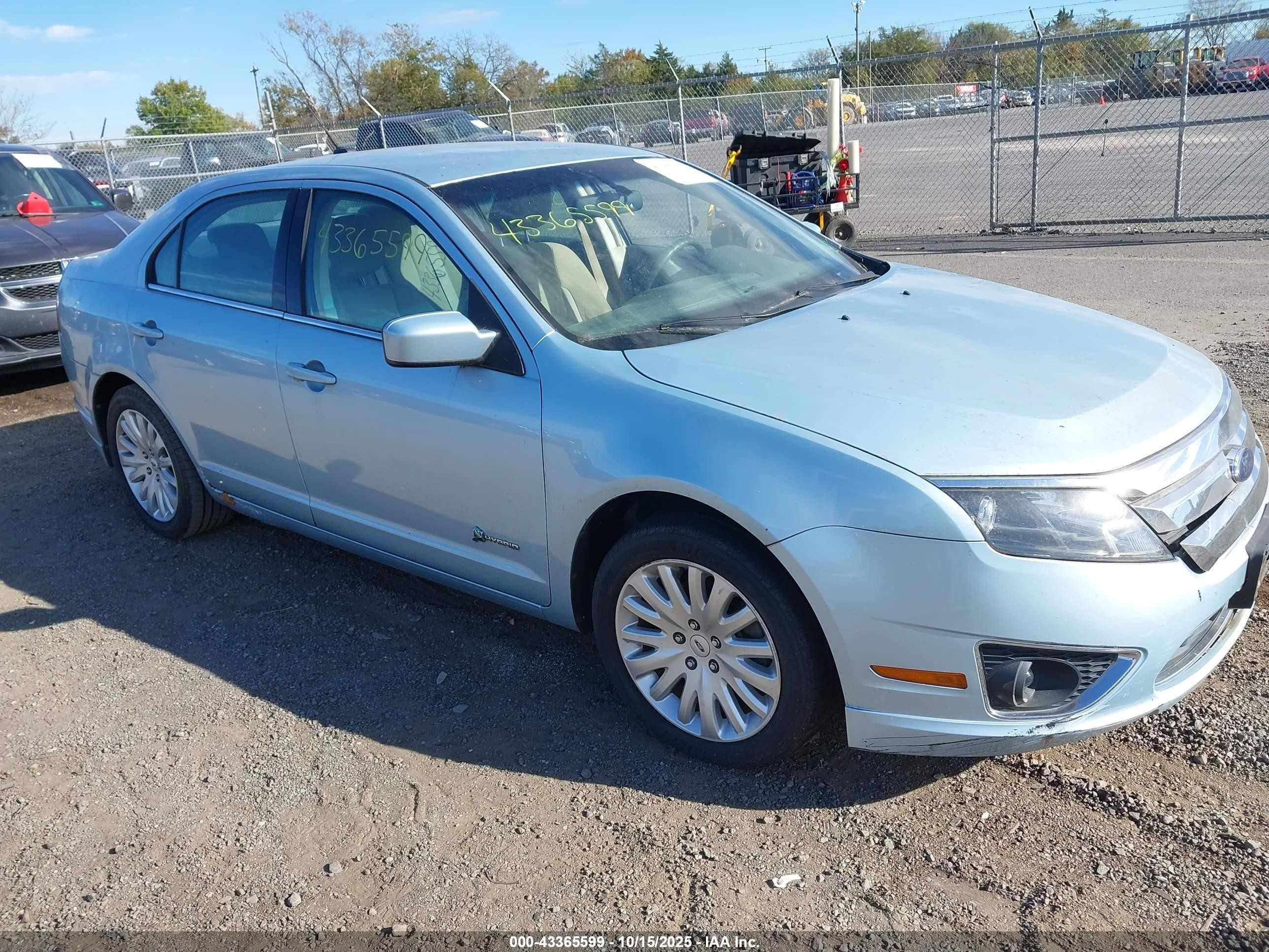 2010 Ford Fusion Hybrid   Blue vin: 3FADP0L38AR148195