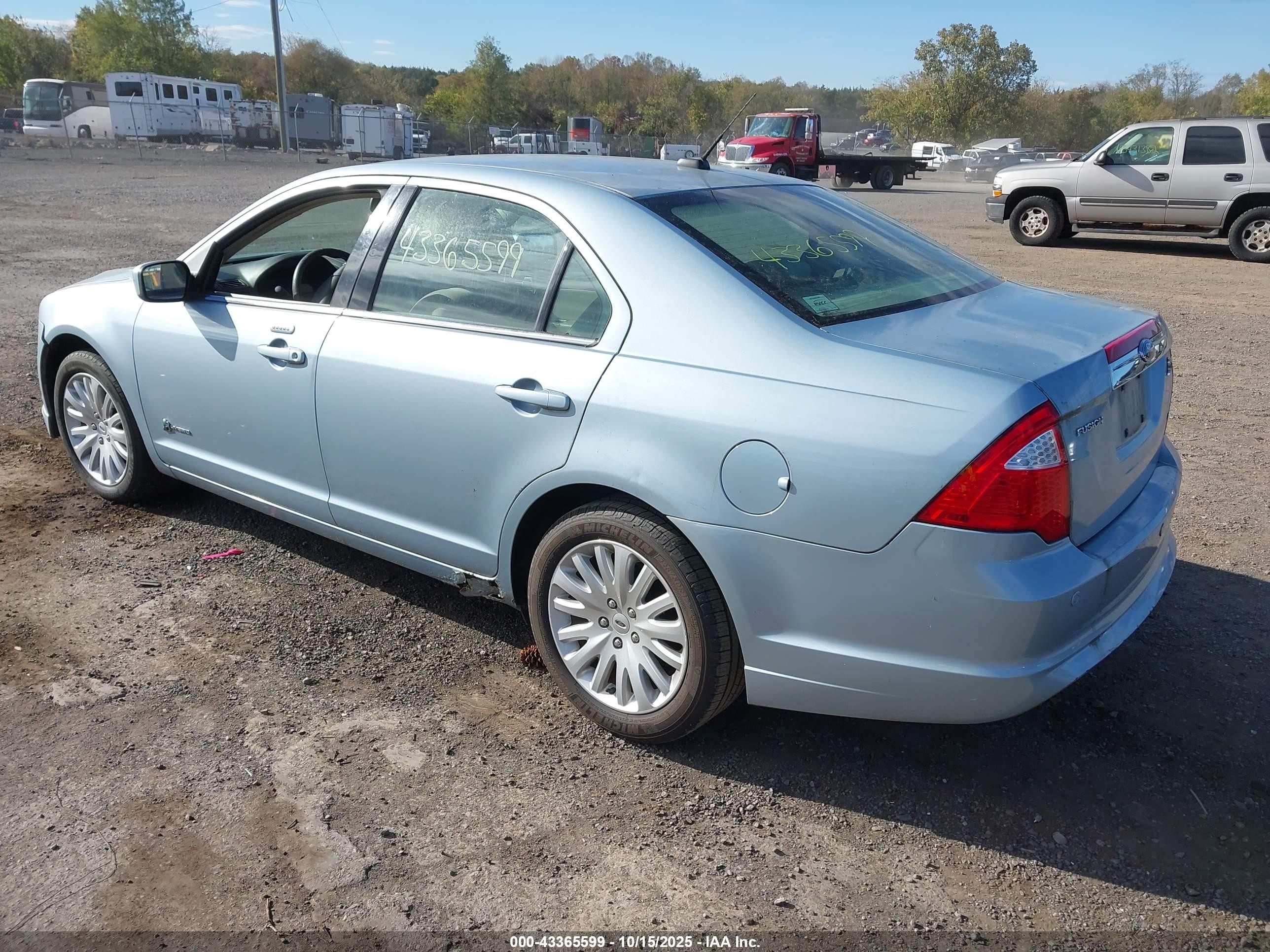 2010 Ford Fusion Hybrid   Blue vin: 3FADP0L38AR148195