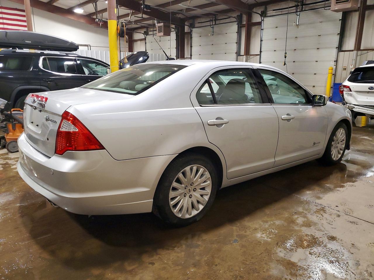 2010 Ford Fusion Hybrid Серебряный vin: 3FADP0L38AR327773