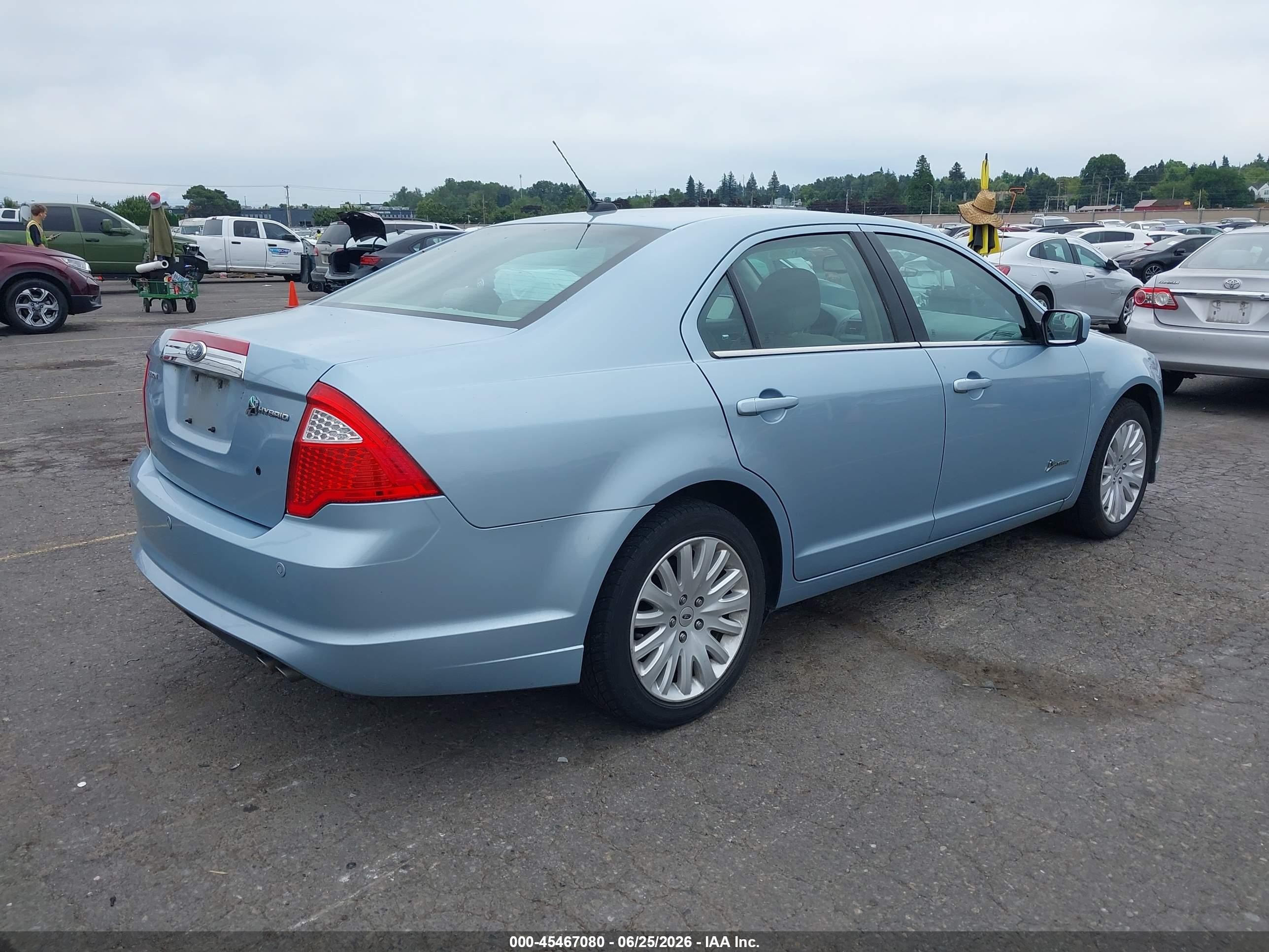2010 Ford Fusion Hybrid   Light Blue vin: 3FADP0L38AR406506