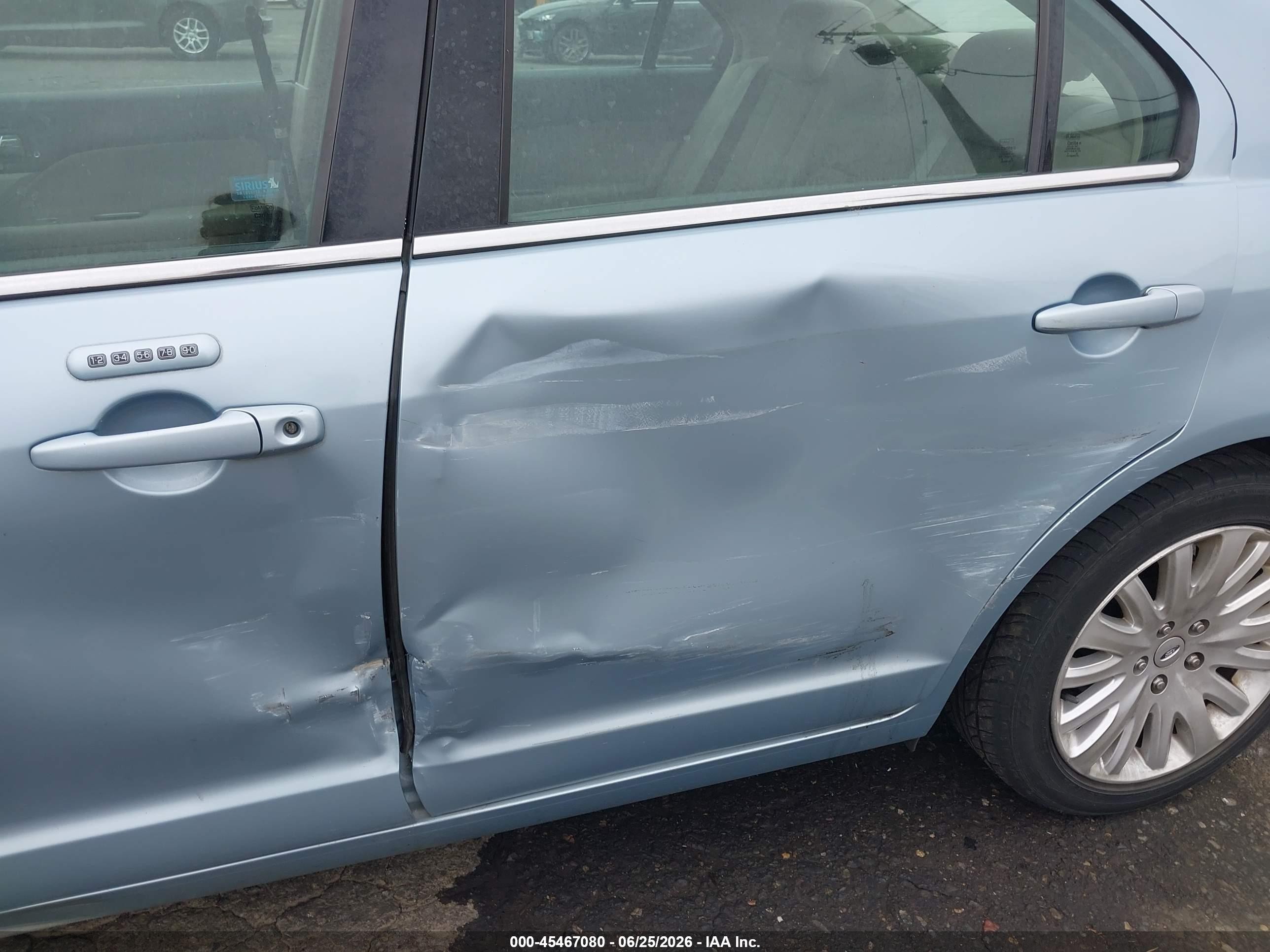 2010 Ford Fusion Hybrid   Light Blue vin: 3FADP0L38AR406506