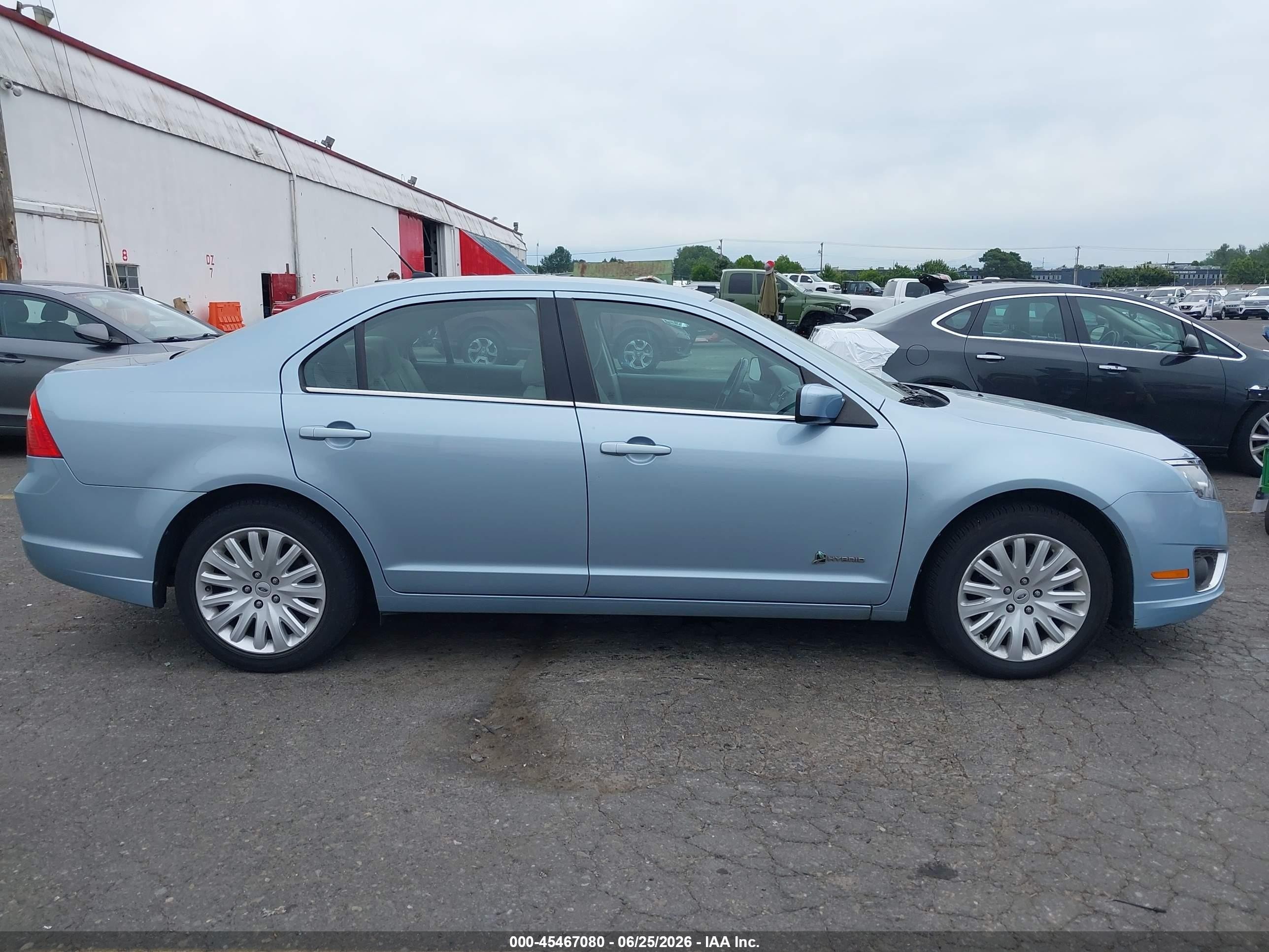 2010 Ford Fusion Hybrid   Light Blue vin: 3FADP0L38AR406506