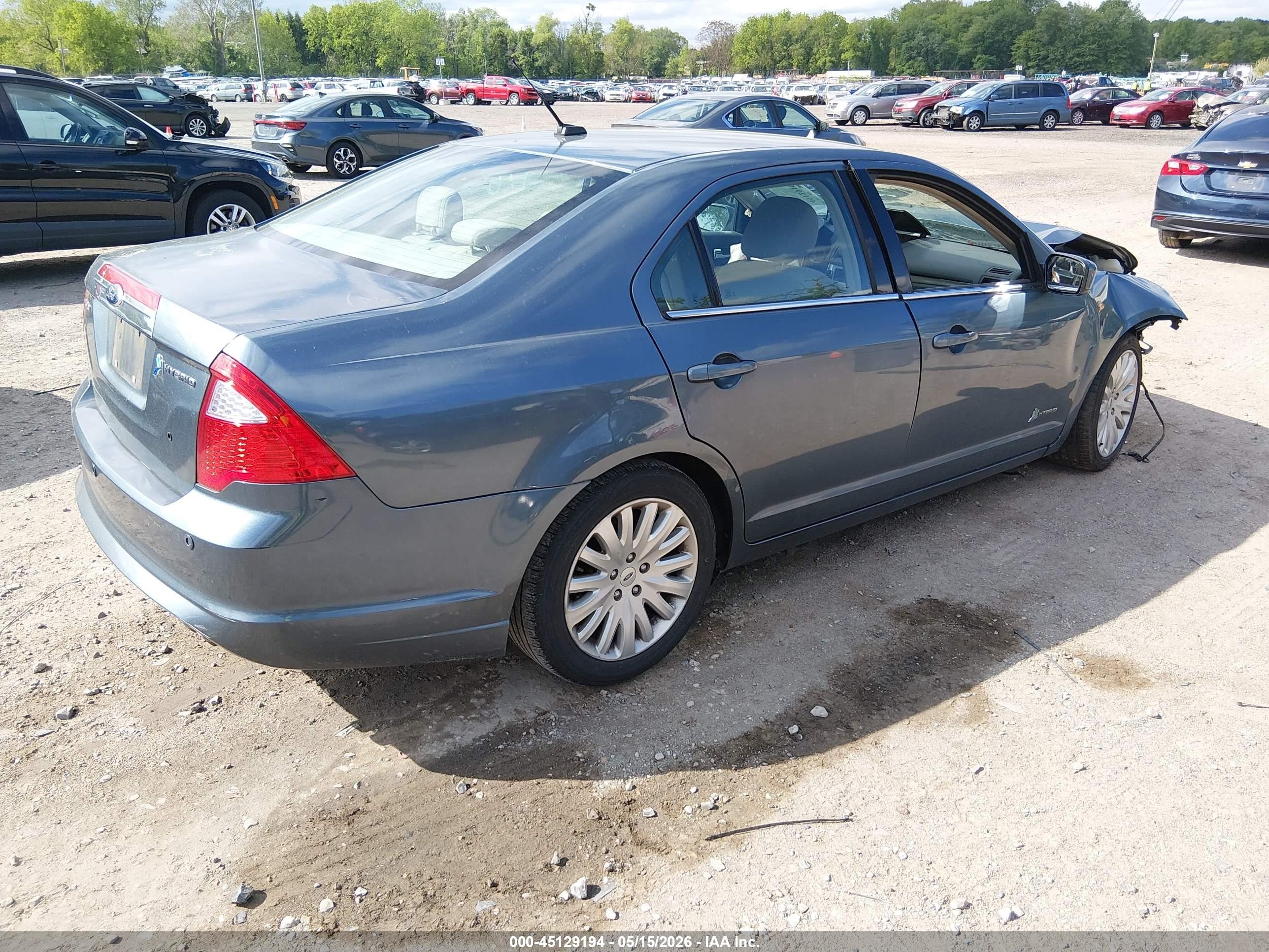 2012 Ford Fusion Hybrid   Turquoise vin: 3FADP0L38CR322172