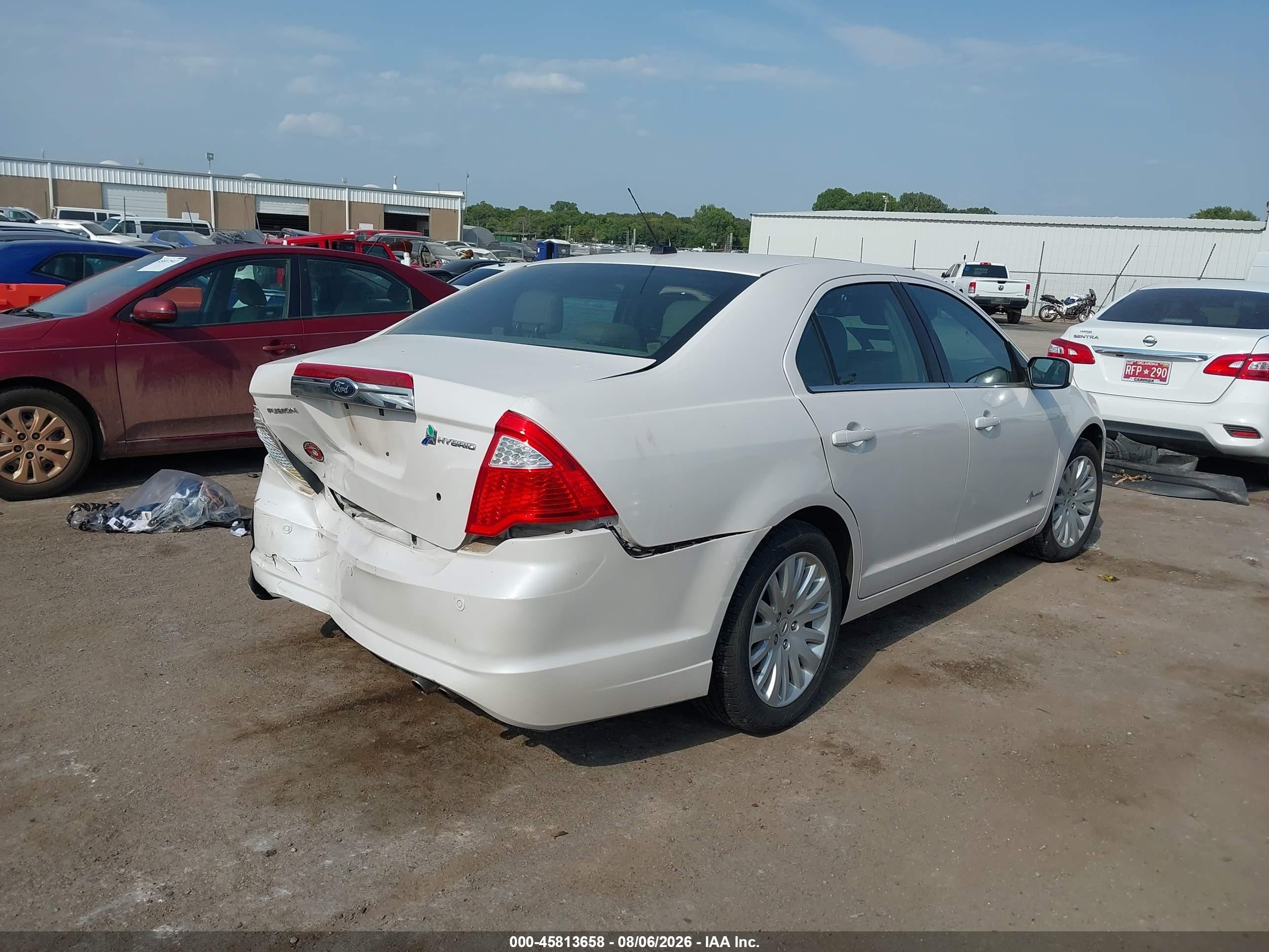 2012 Ford Fusion Hybrid Коричневый vin: 3FADP0L38CR414933