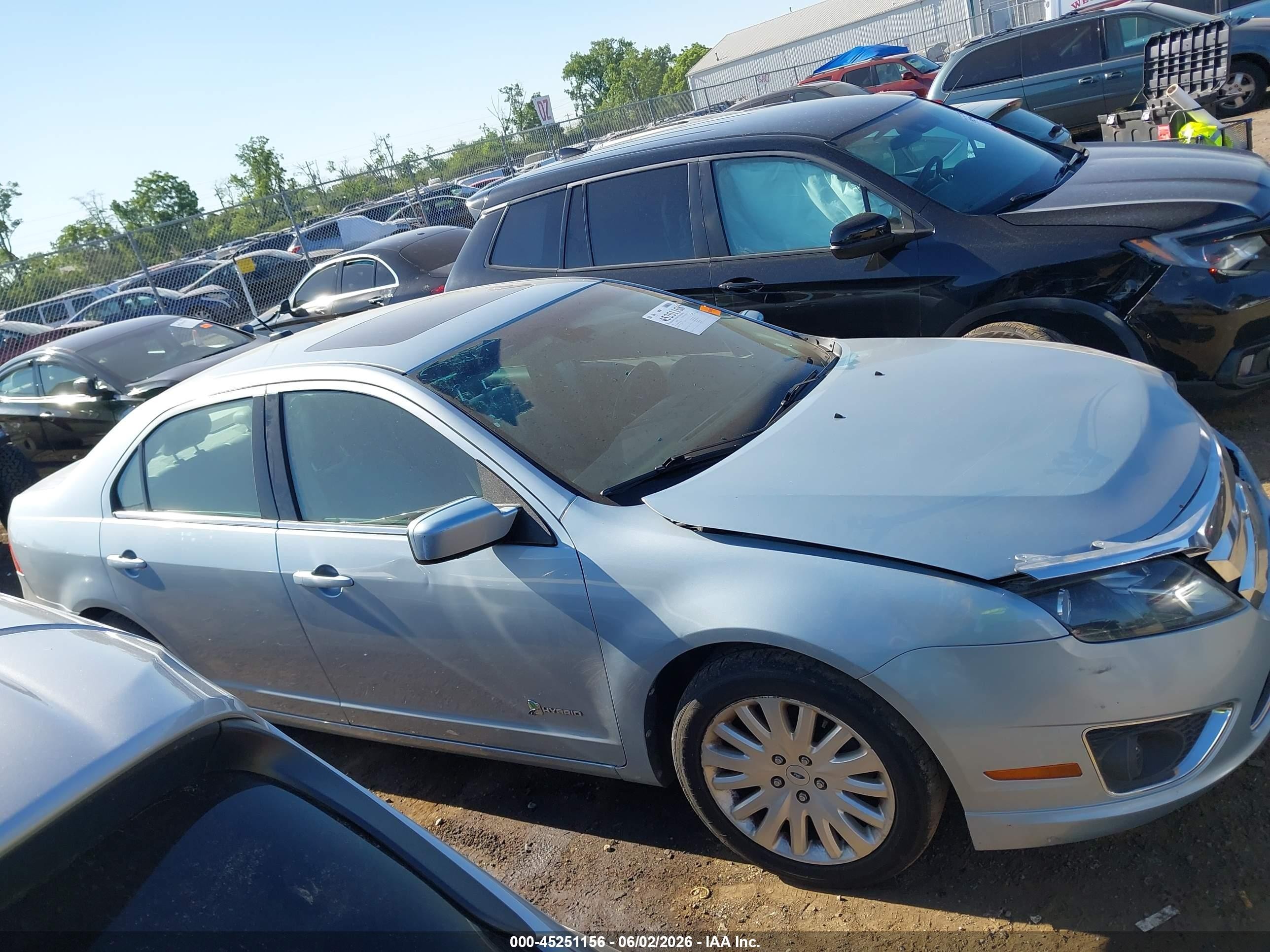 2011 Ford Fusion Hybrid   Light Blue vin: 3FADP0L39BR335690