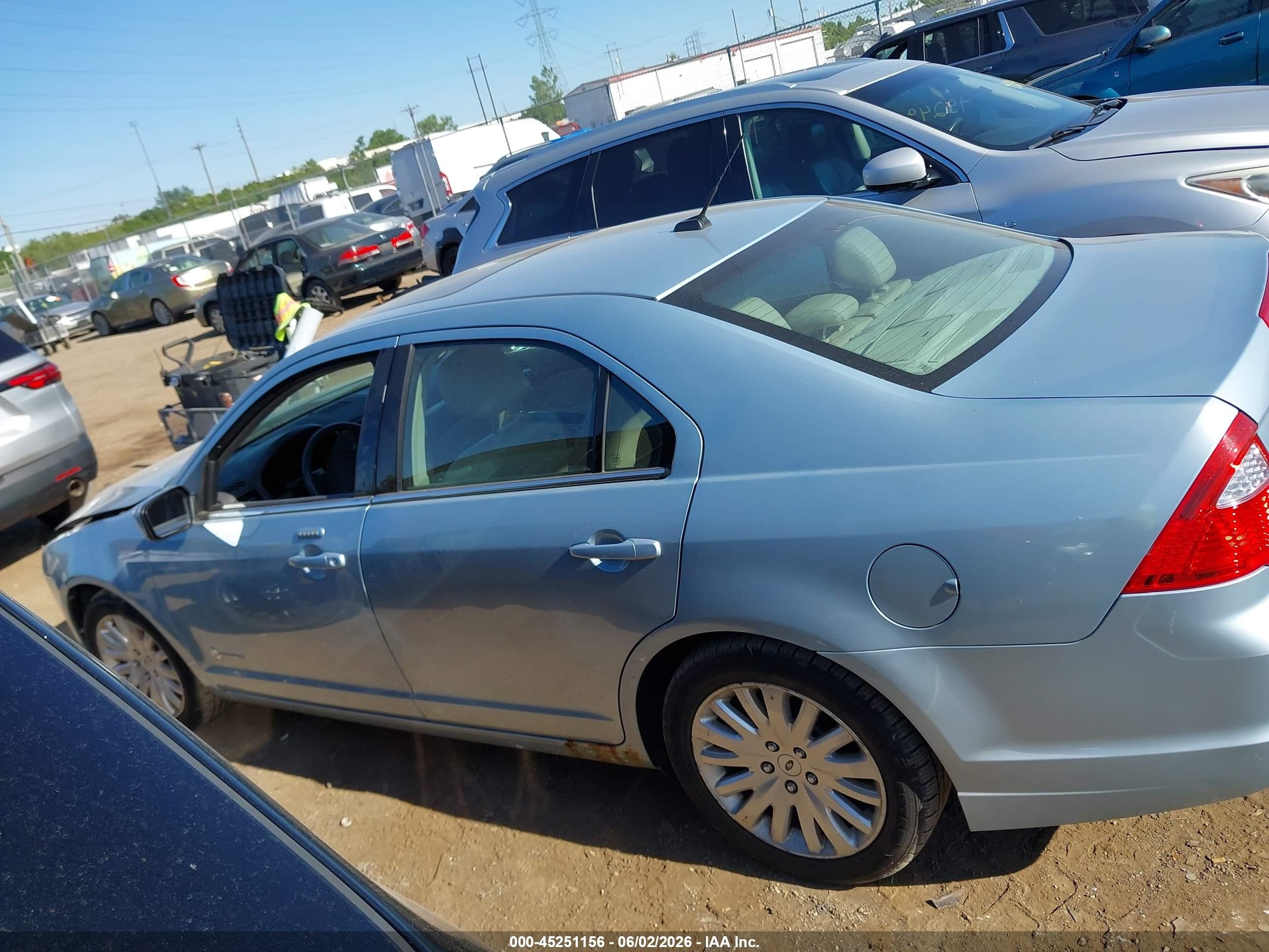 2011 Ford Fusion Hybrid   Light Blue vin: 3FADP0L39BR335690