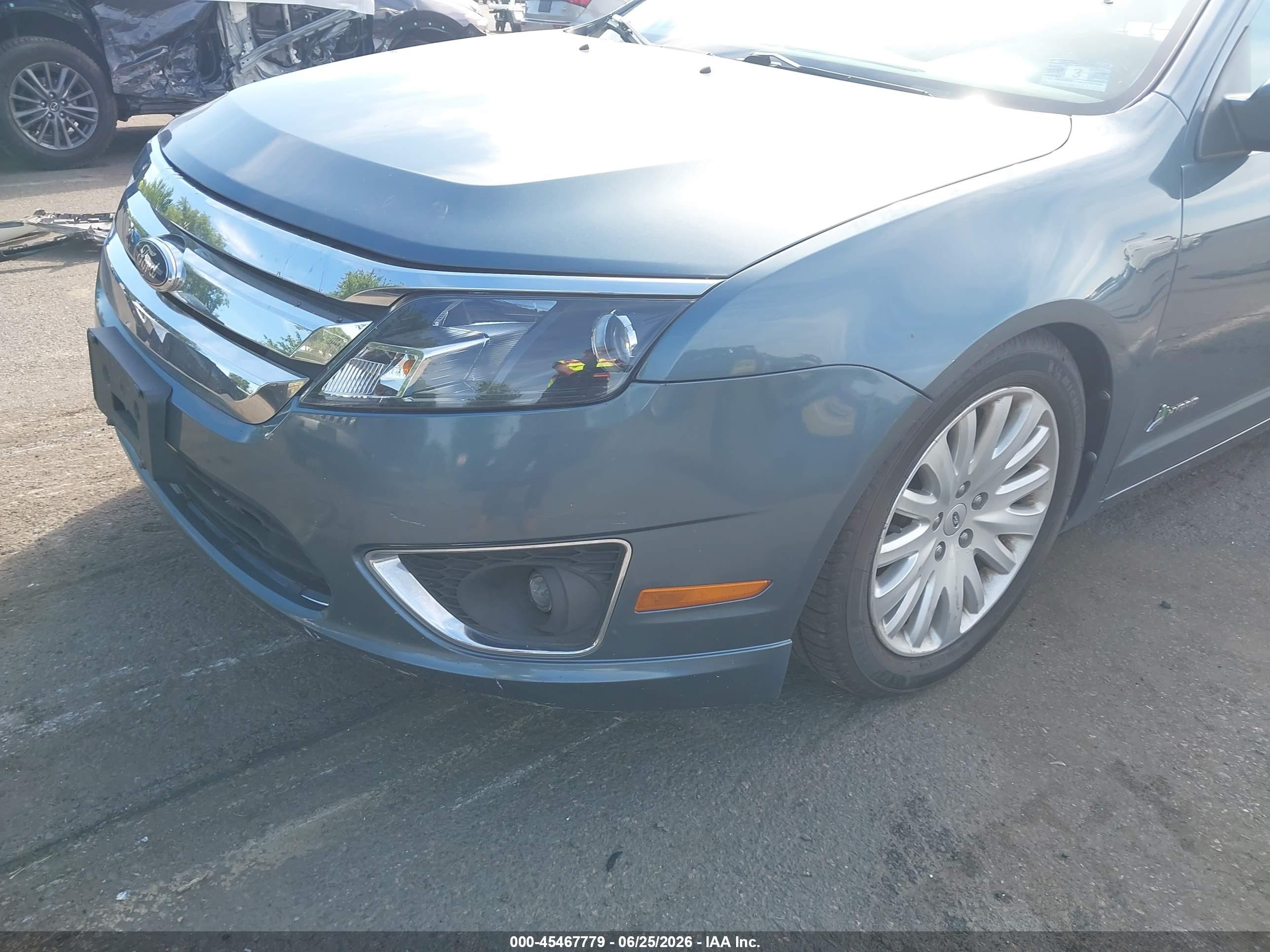 2012 Ford Fusion Hybrid   Синий vin: 3FADP0L3XCR314297