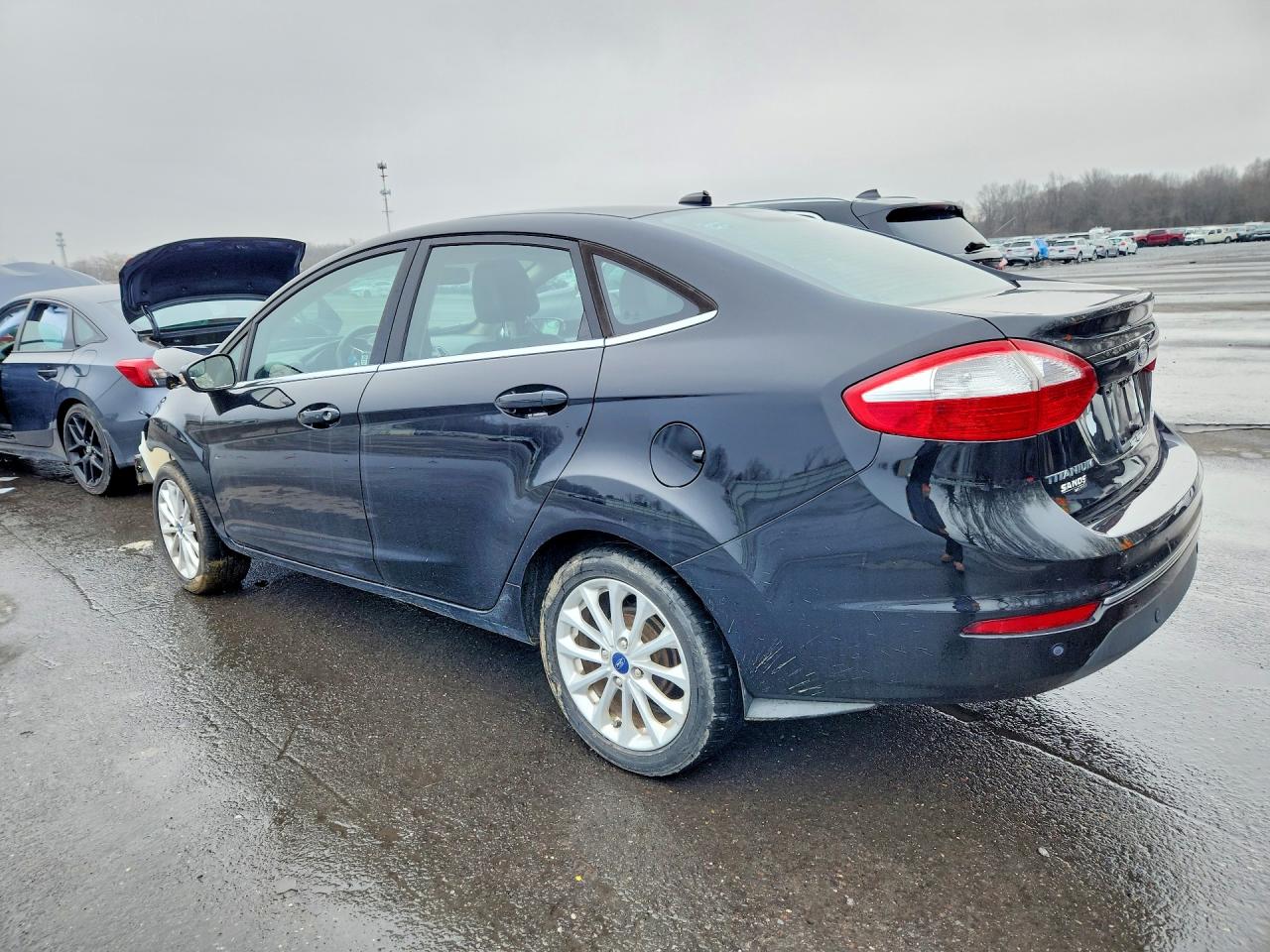 2017 Ford Fiesta Titanium Black vin: 3FADP4CJ5HM158616