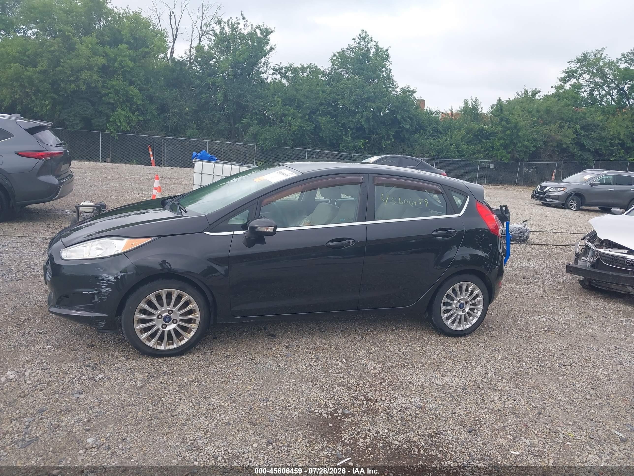 2014 Ford Fiesta Titanium Black vin: 3FADP4FJ2EM151095