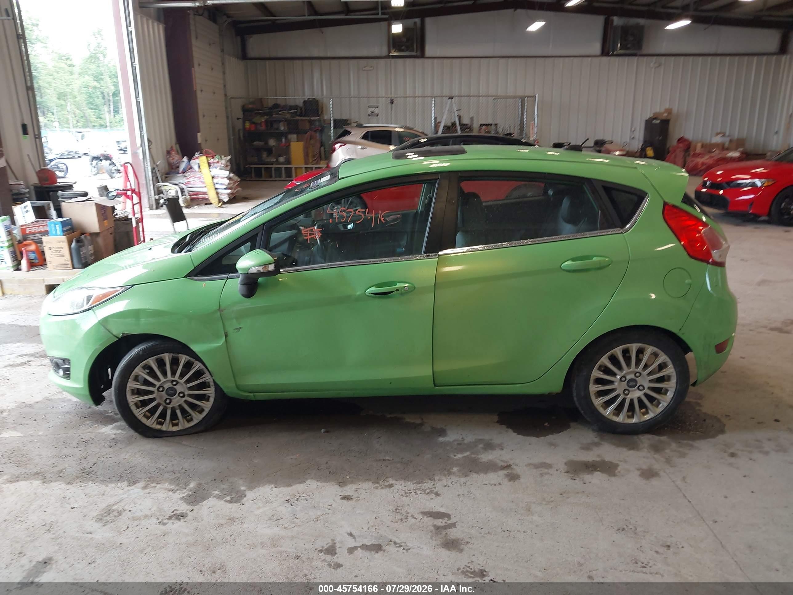2014 Ford Fiesta Titanium Green vin: 3FADP4FJ4EM132001
