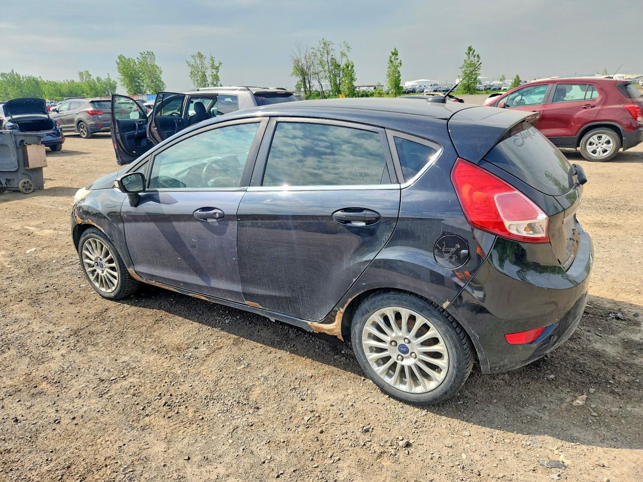 2014 Ford Fiesta Titanium Black vin: 3FADP4FJ4EM185488