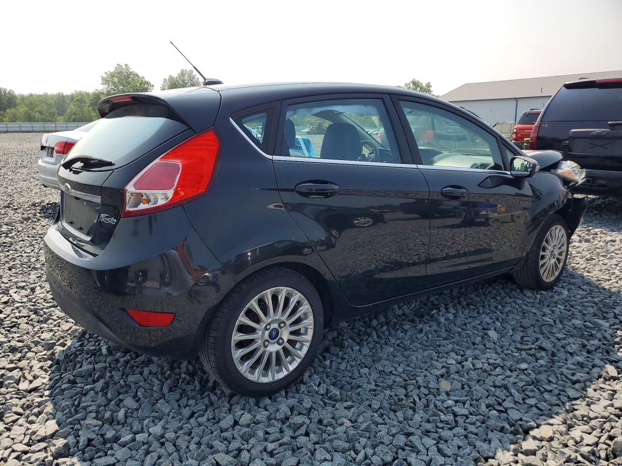 2015 Ford Fiesta Titanium Черный vin: 3FADP4FJXFM205633