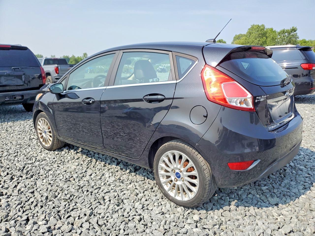 2015 Ford Fiesta Titanium Черный vin: 3FADP4FJXFM205633
