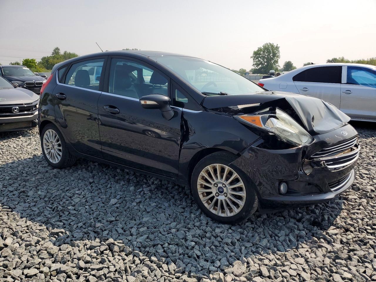 2015 Ford Fiesta Titanium Черный vin: 3FADP4FJXFM205633