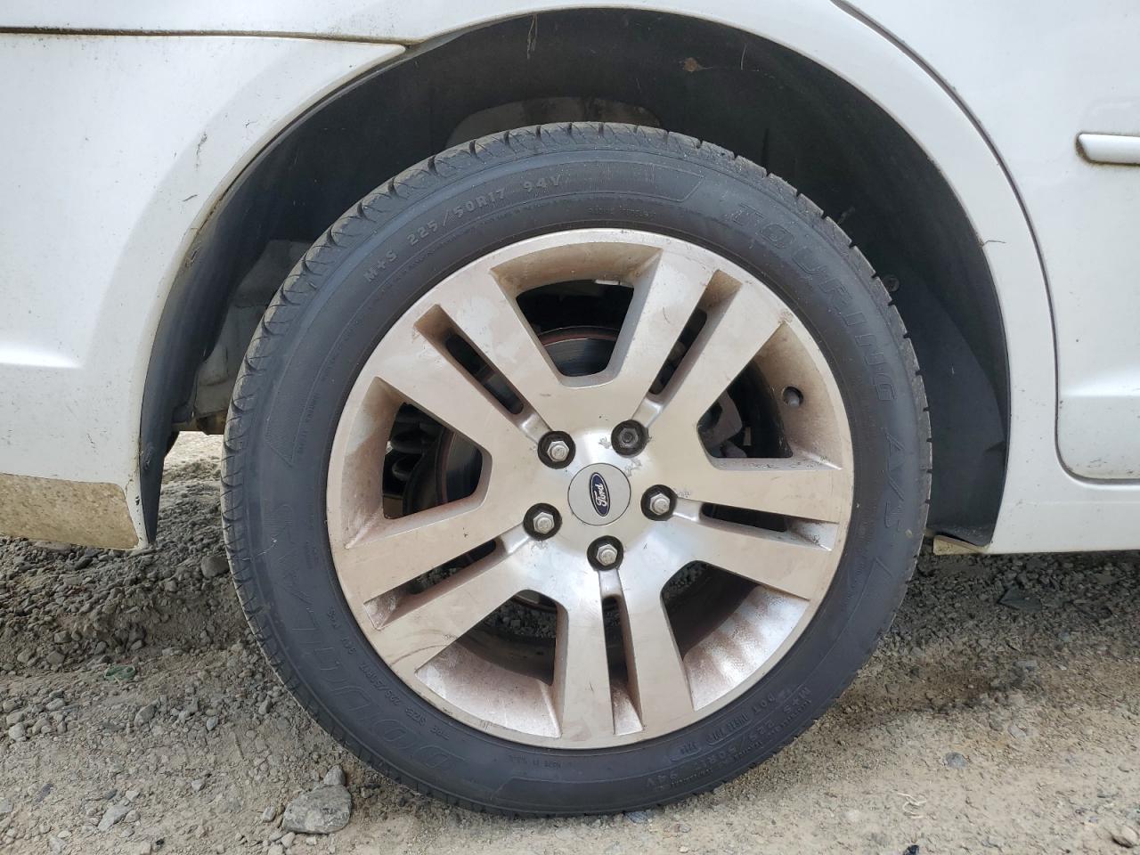 2006 Ford Fusion Sel White vin: 3FAFP08Z76R143700 Damage: Right Rear Wheel, Curb Rash, 2 To 3 Inches