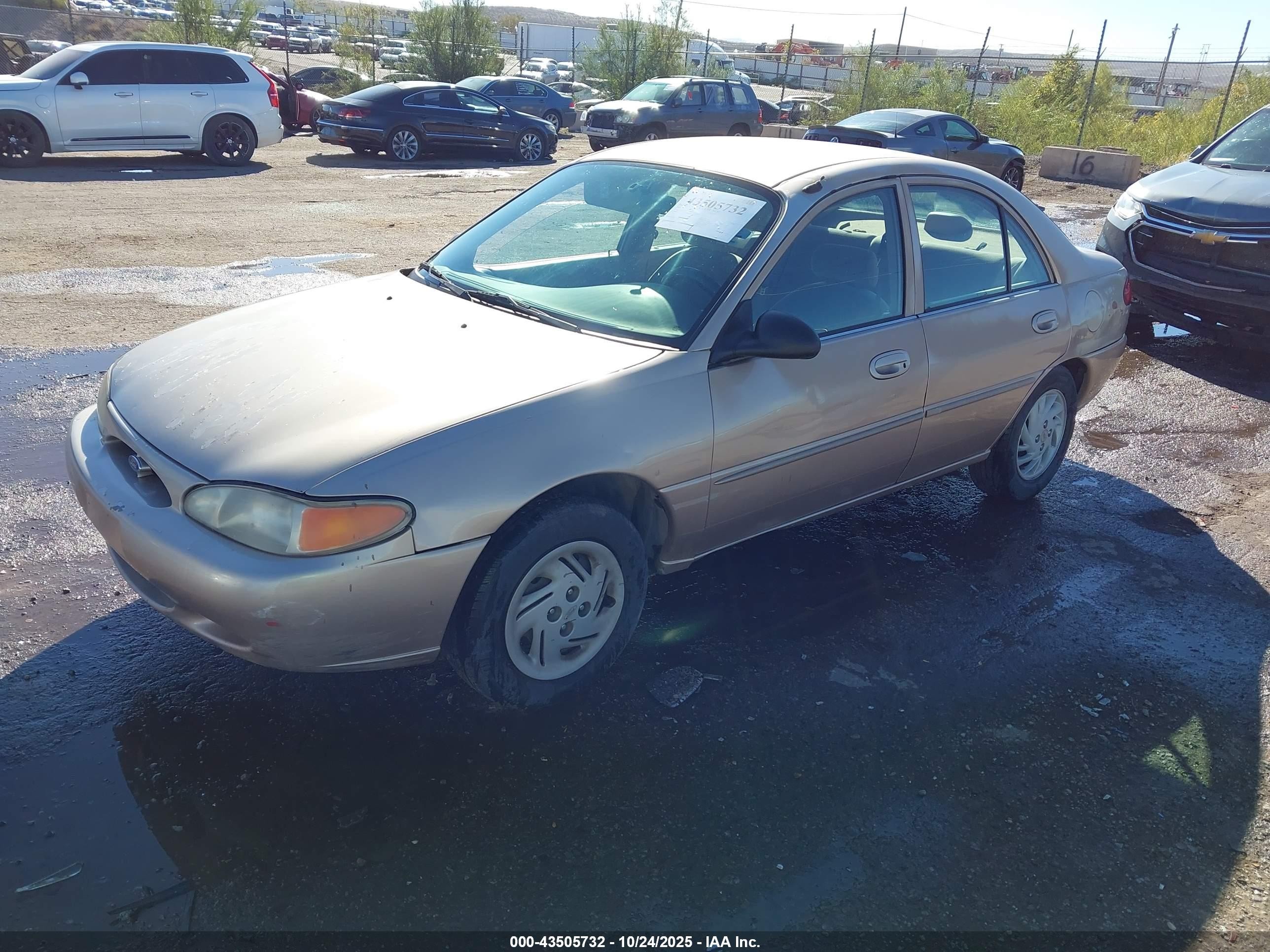 2000 Ford Escort   Tan vin: 3FAFP13P9YR208934