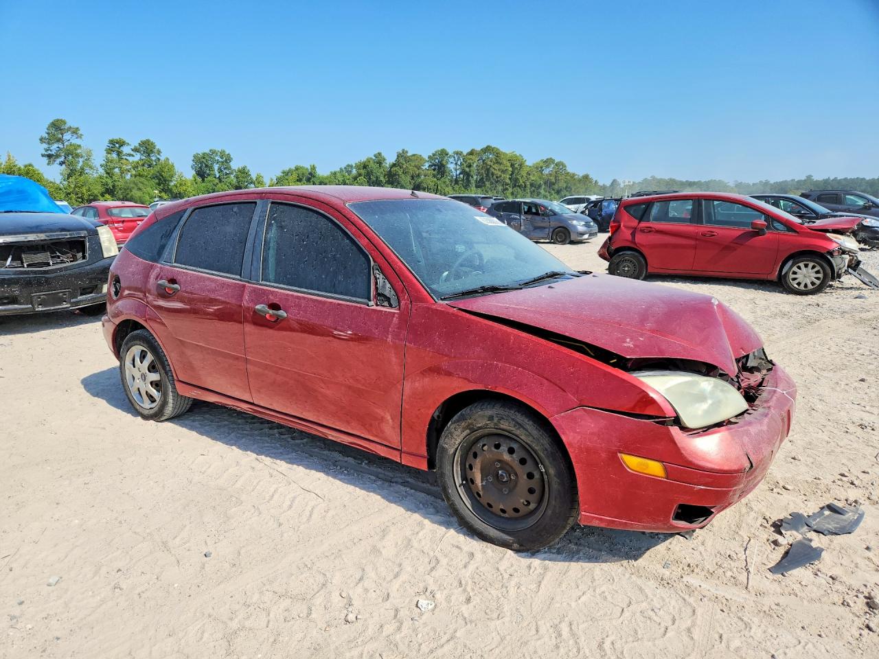 2005 Ford Focus Burgundy vin: 3FAFP37N35R117450