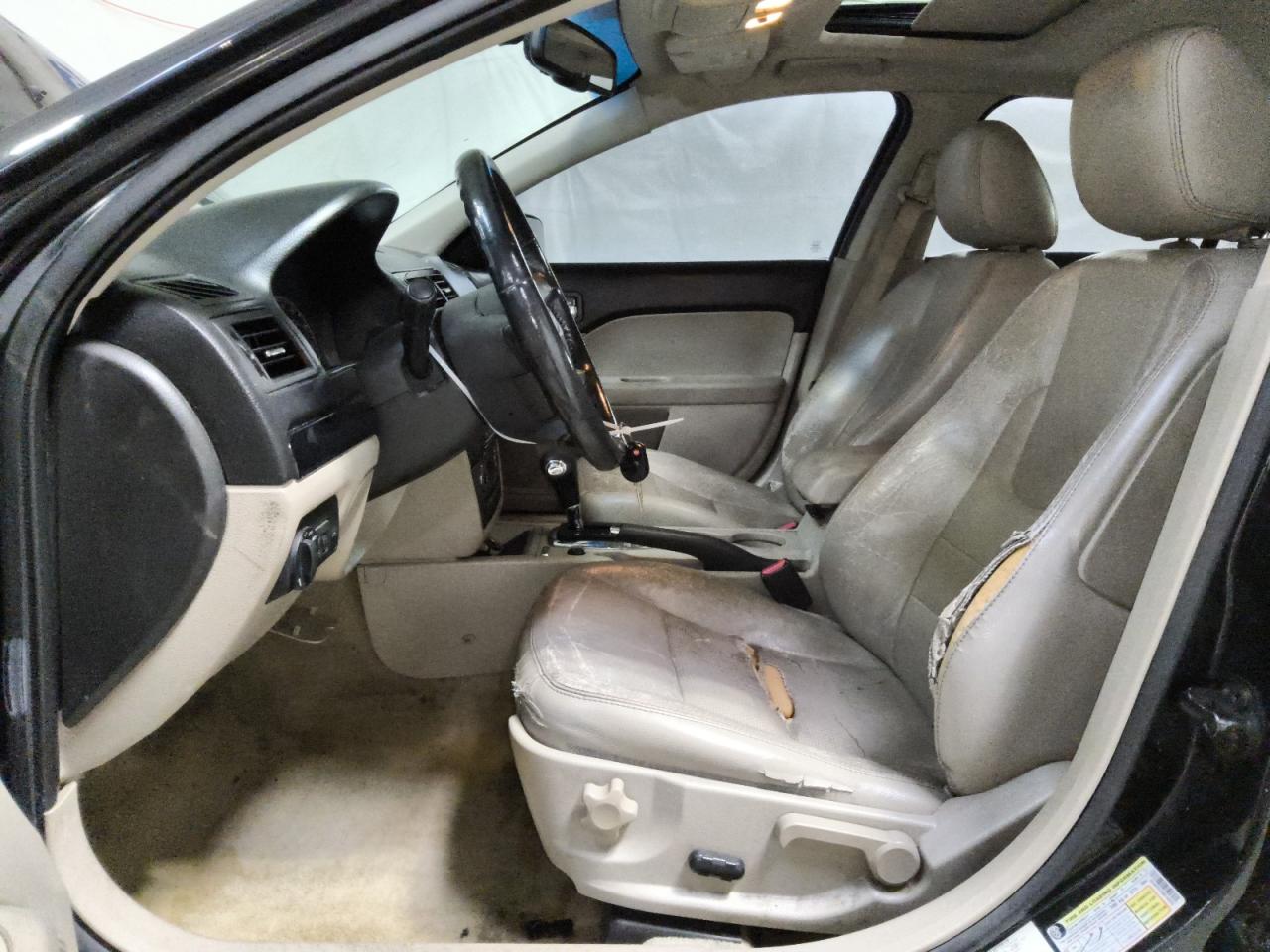 2009 Ford Fusion Sel Black vin: 3FAHP02169R146930 Damage: Left Front Seat, Worn, Replacement Required