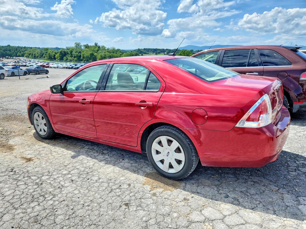 2009 Ford Fusion S Red vin: 3FAHP06Z69R109876
