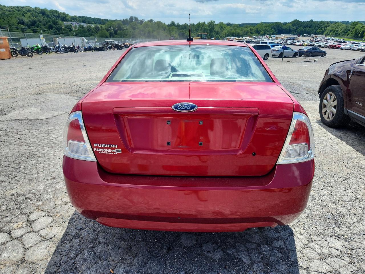 2009 Ford Fusion S Red vin: 3FAHP06Z69R109876