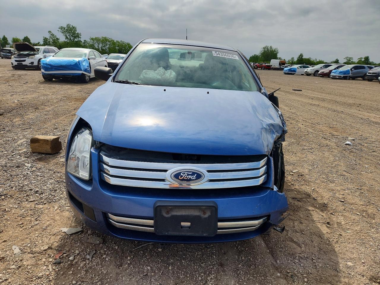 2009 Ford Fusion S Blue vin: 3FAHP06Z99R110908