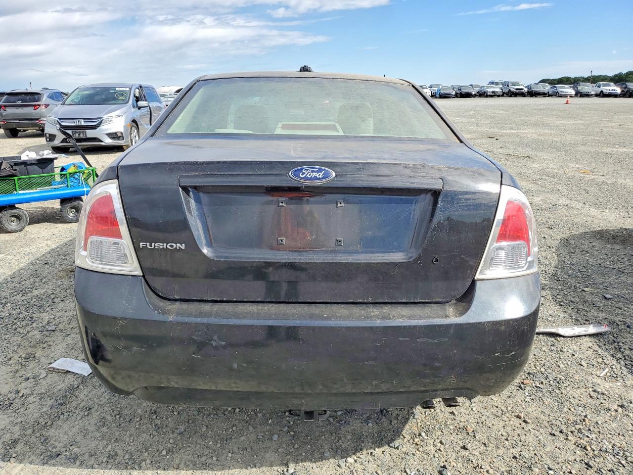 2009 Ford Fusion S Black vin: 3FAHP06Z99R213505