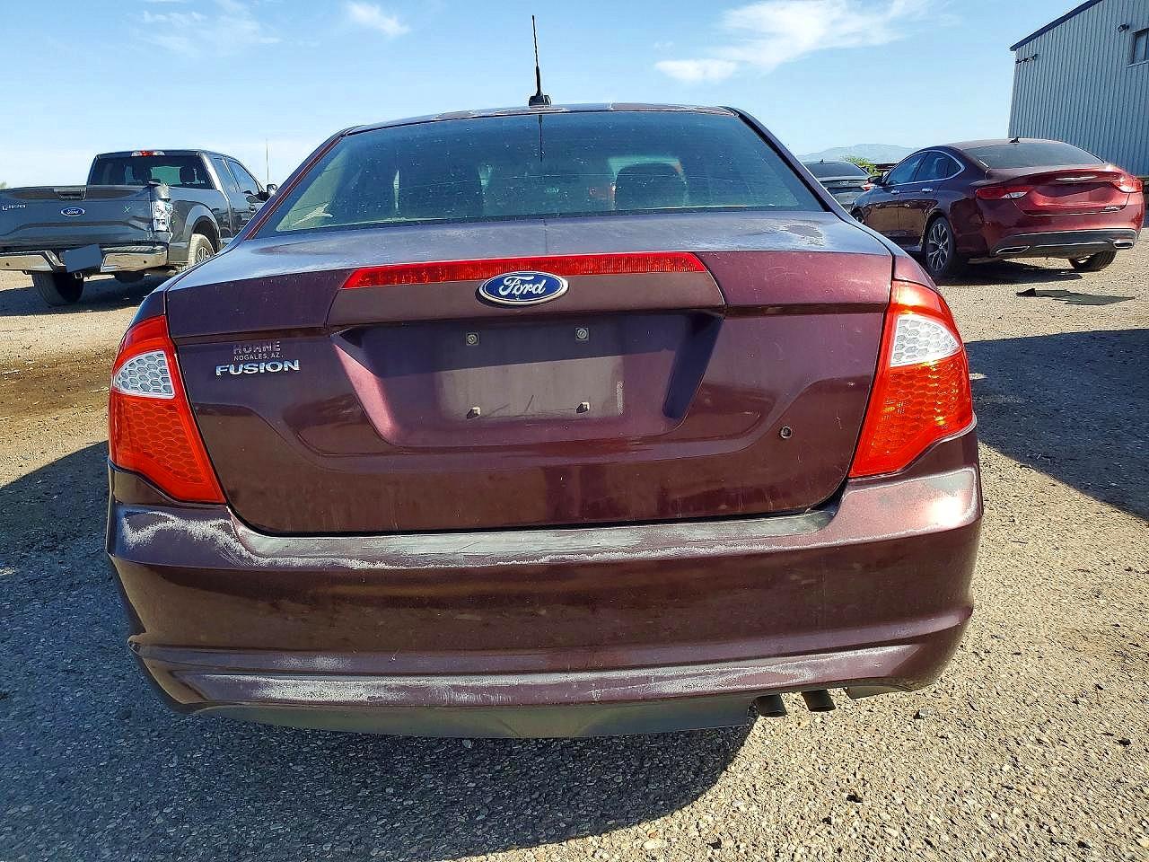 2012 Ford Fusion S Burgundy vin: 3FAHP0GA7CR327650