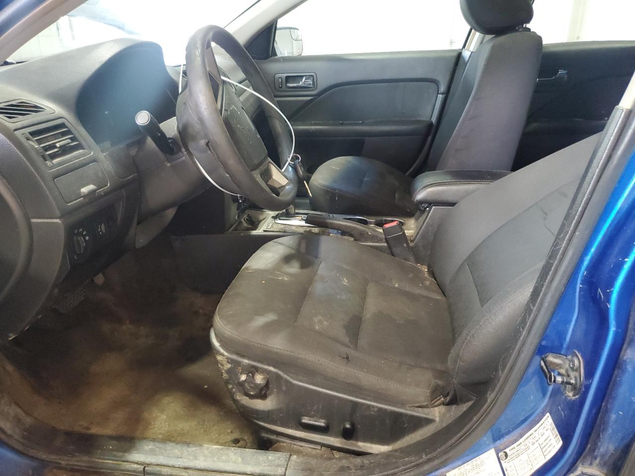 2011 Ford Fusion Se Blue vin: 3FAHP0HA1BR106428 Damage: Left Front Seat, Burn Hole, 1/8 To 1/2 Inch