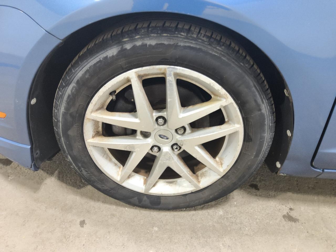 2010 Ford Fusion Sel Blue vin: 3FAHP0JA0AR237293 Damage: Left Front Wheel, Curb Rash, > 12 Inches