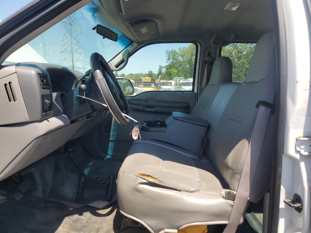 2001 Ford F250 Super Duty White vin: 3FTNW21L21MA23156 Damage: Left Front Seat Cushion, Torn, > 12 Inches