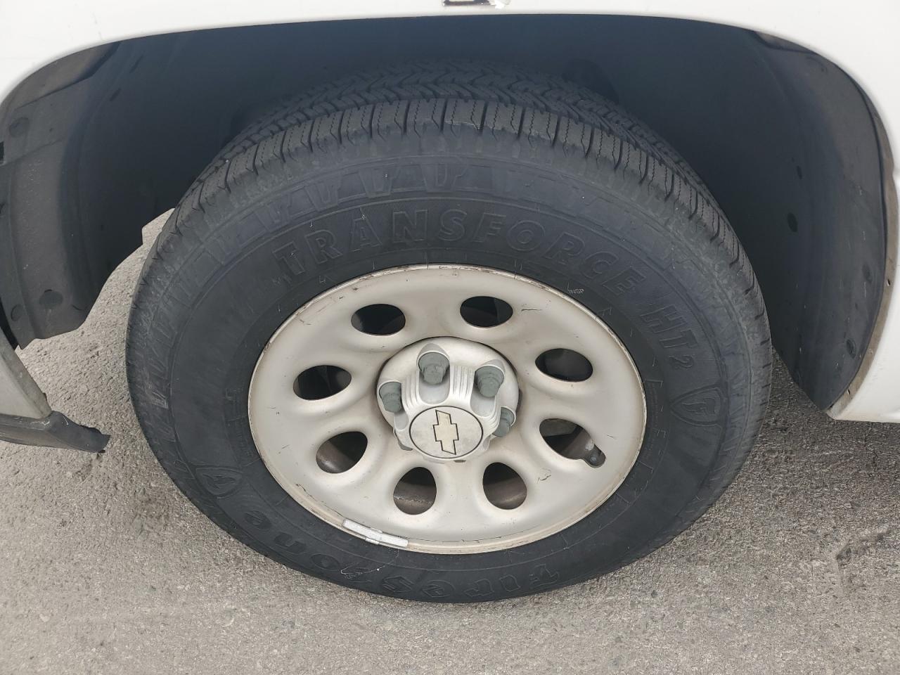 2007 Chevrolet Silverado C1500 Classic White vin: 3GCEC14V87G175207 Damage: Left Front Wheel, Chipped, 10 Or More