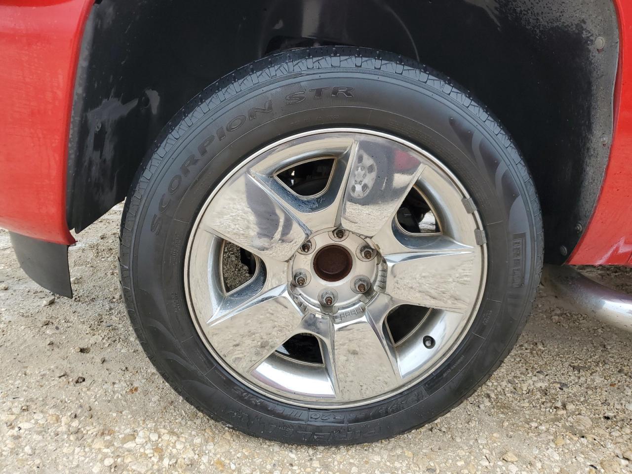 2011 Chevrolet Silverado C1500 Lt Red vin: 3GCPCSE04BG405643 Damage: Left Front Center Cap, Missing, Replacement Required