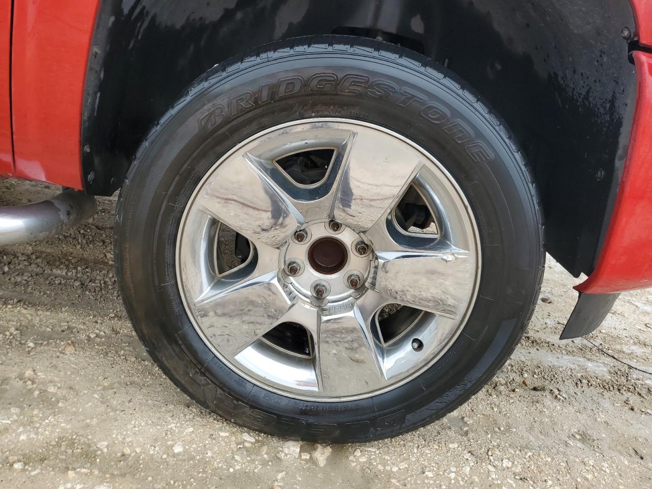2011 Chevrolet Silverado C1500 Lt Red vin: 3GCPCSE04BG405643 Damage: Right Front Center Cap, Missing, Replacement Required