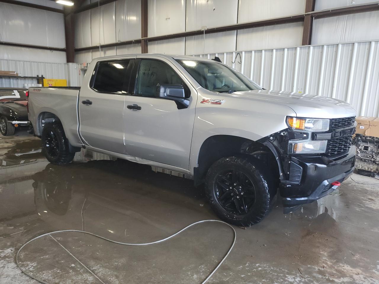 2019 Chevrolet Silverado K1500 Trail Boss Custom Silver vin: 3GCPYCEF0KG143048 Damage: Front Bumper Right Molding, Missing, Replacement Required