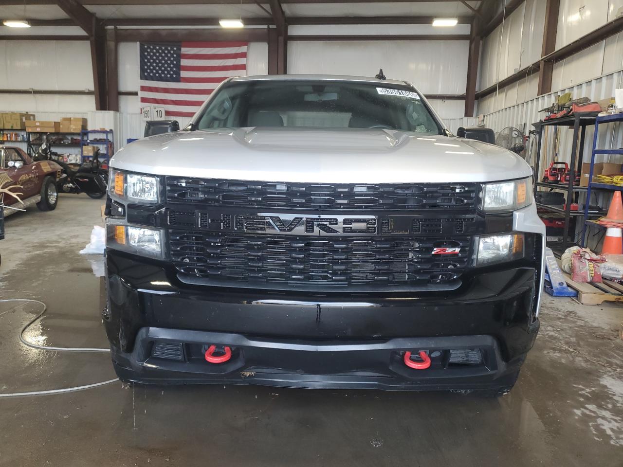 2019 Chevrolet Silverado K1500 Trail Boss Custom Silver vin: 3GCPYCEF0KG143048 Damage: Front Bumper, Dent(S) W/No Paint Dmg, 2 To 3 Inches