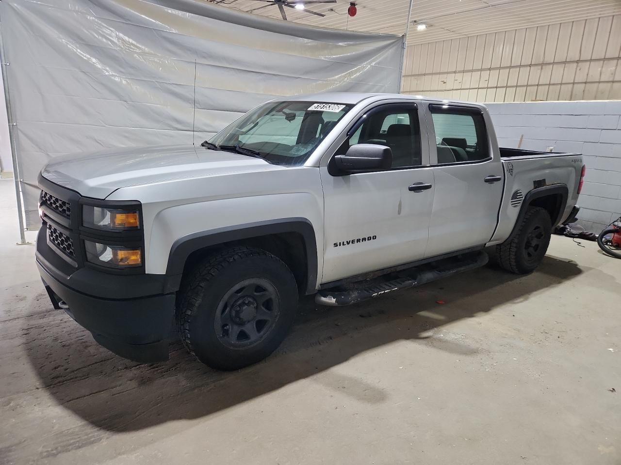 2014 Chevrolet Silverado K1500 Silver vin: 3GCUKPEC5EG346507 Damage: Left Front Door, Dent(S) W/ Paint Dmg, 8 To 9 Inches