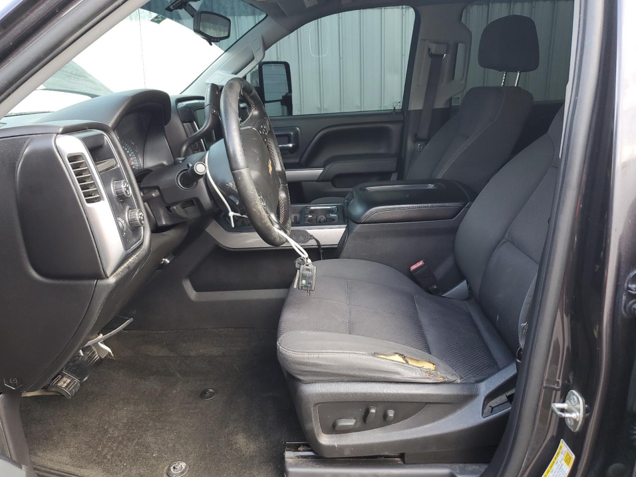 2015 Chevrolet Silverado K1500 Lt Silver vin: 3GCUKREC5FG203182 Damage: Left Front Seat Cushion, Torn, 7 To 8 Inches