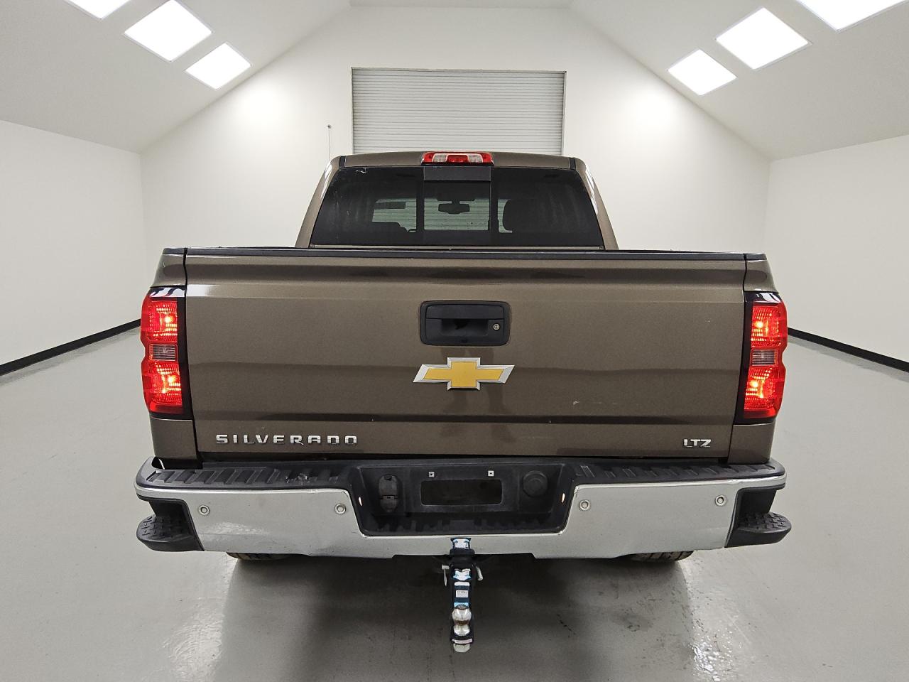 2014 Chevrolet Silverado K1500 Ltz Brown vin: 3GCUKSEC3EG497946 Damage: Rear Metal Bumper Chrome, Dent(S) W/No Paint Dmg, 2 To 3 Inches