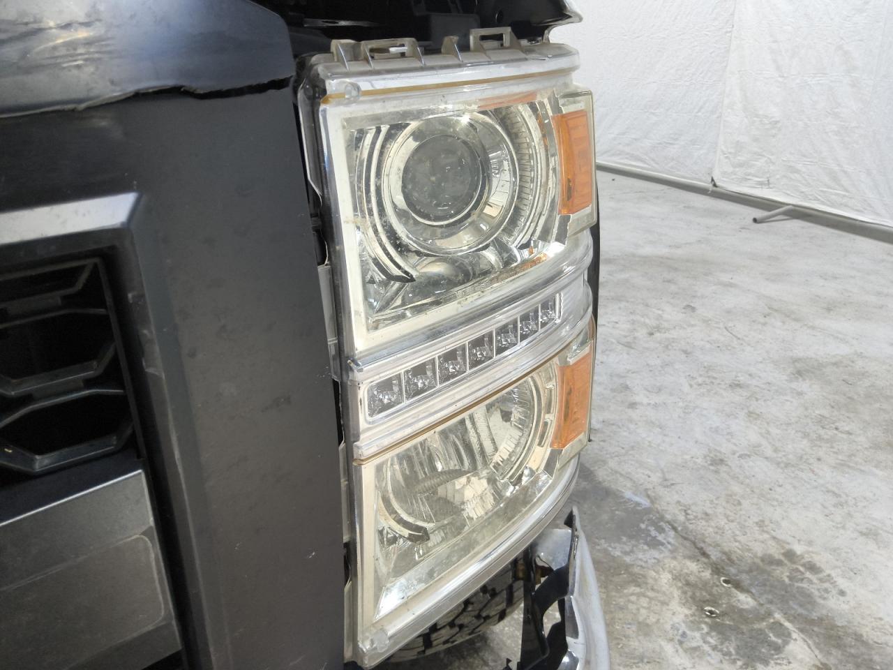 2015 Chevrolet Silverado K1500 Ltz Silver vin: 3GCUKSEJ7FG359889 Damage: Left Head Lamp, Broken, Replacement Required
