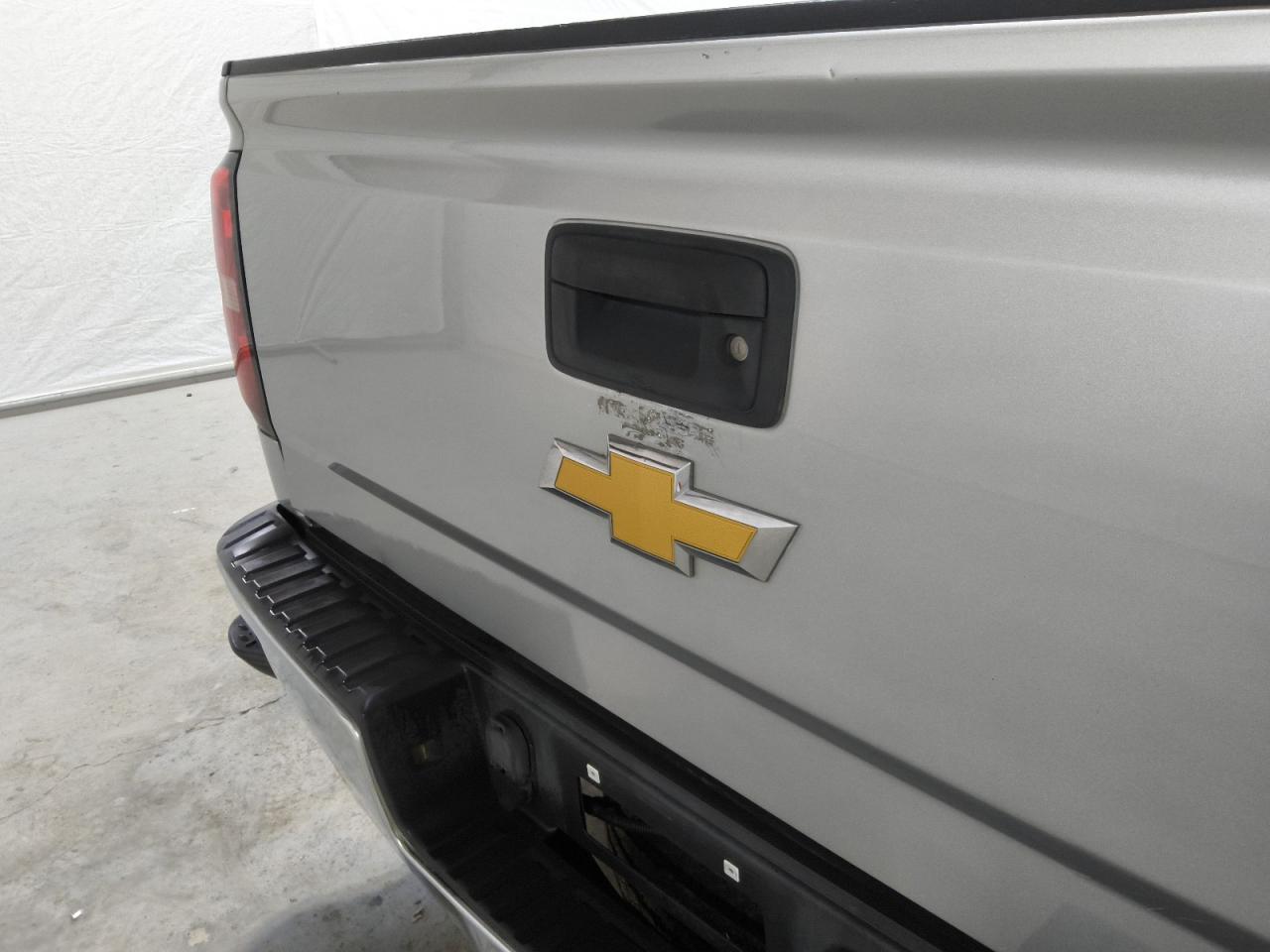2015 Chevrolet Silverado K1500 Ltz Silver vin: 3GCUKSEJ7FG359889 Damage: Tailgate, Dent(S) W/ Paint Dmg, 4 To 5 Inches