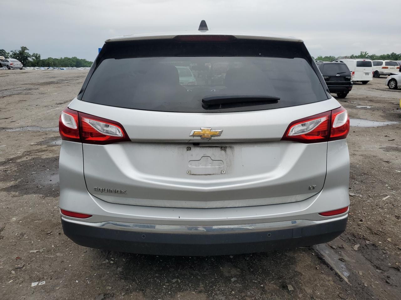 2021 Chevrolet Equinox Lt Silver vin: 3GNAXJEV0MS161223 Damage: Rear Bumper, Heavy Scratch, 1/2 To 1 Inch
