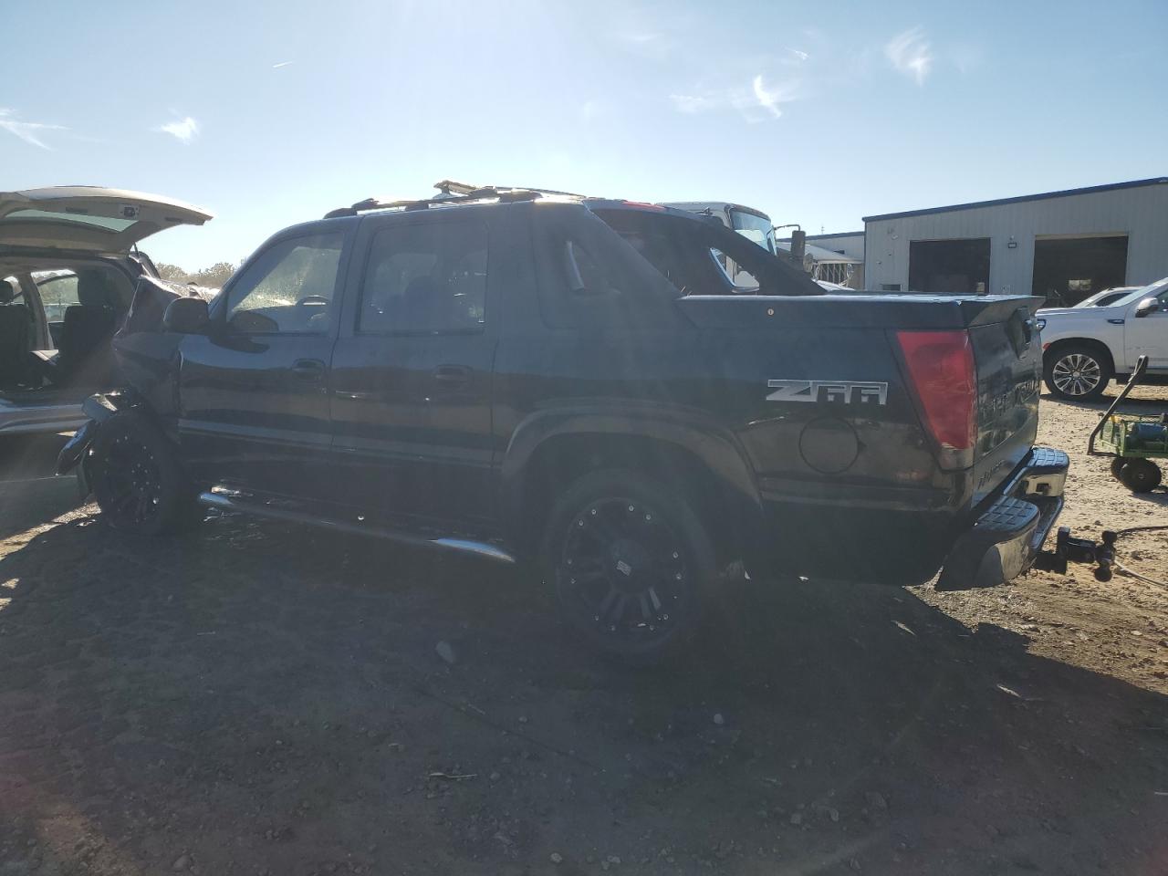 2004 Chevrolet Avalanche C1500 Black vin: 3GNEC12T34G109636