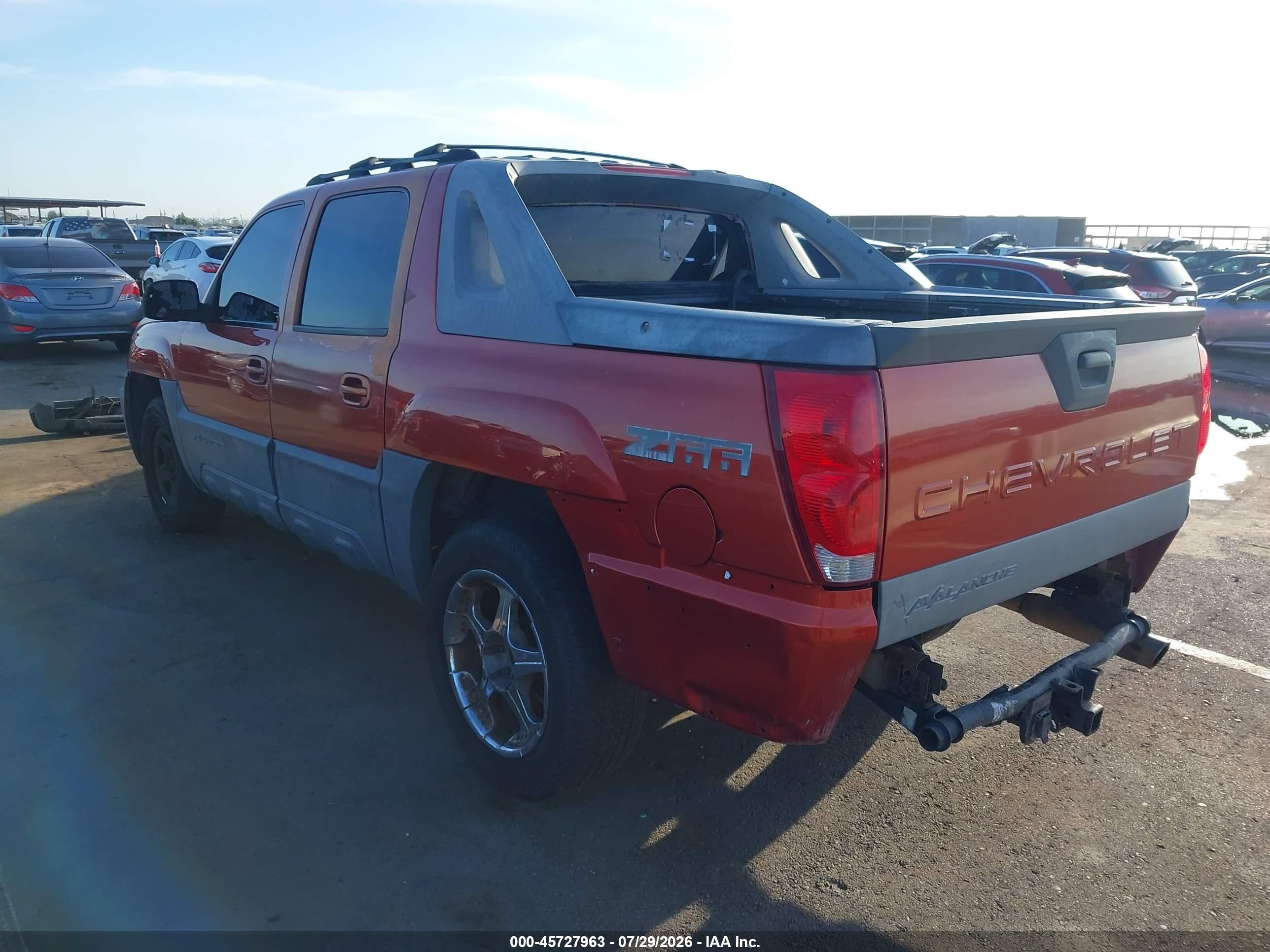 2002 Chevrolet Avalanche 1500   Orange vin: 3GNEC13T62G221777