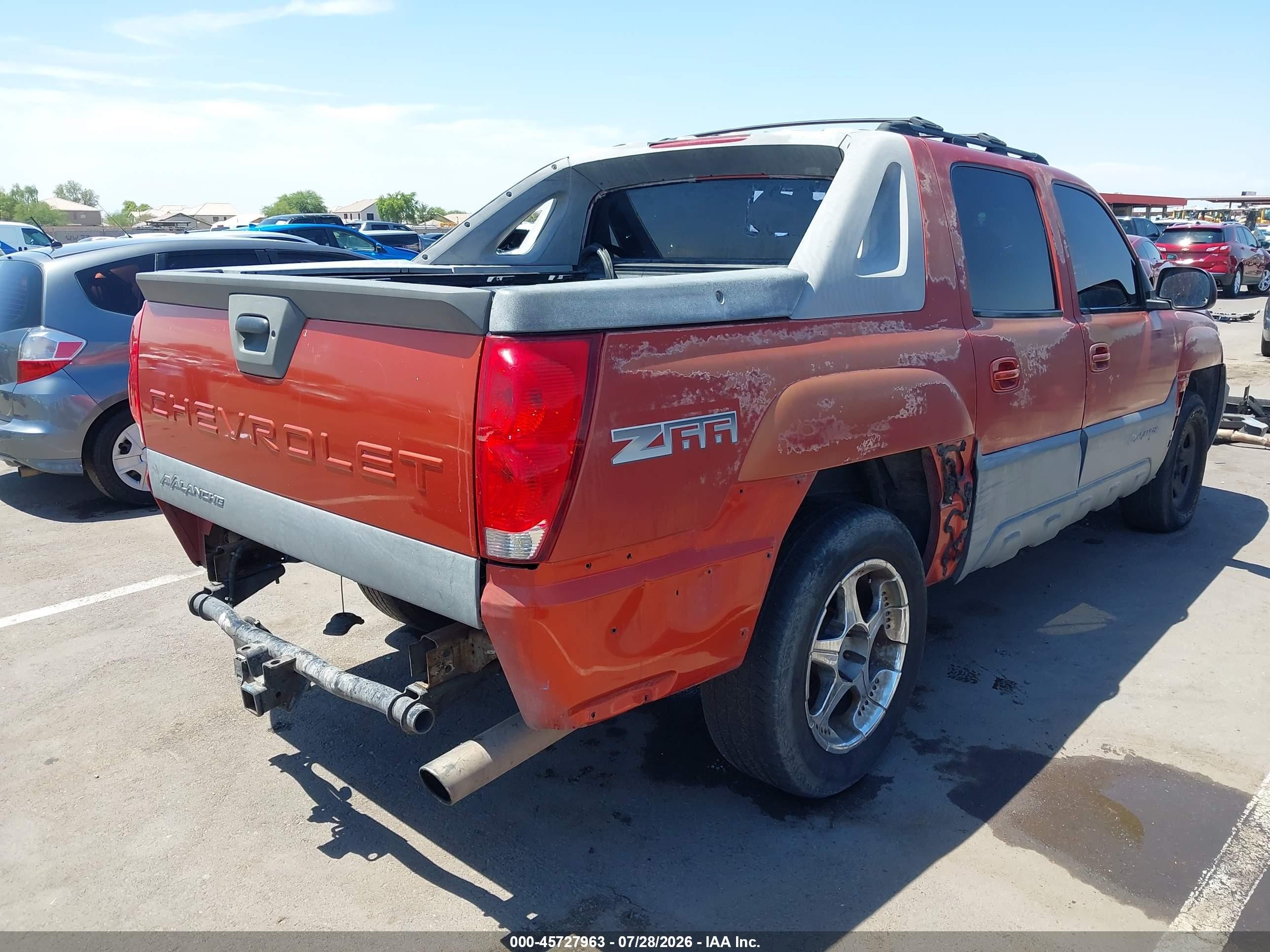 2002 Chevrolet Avalanche 1500   Orange vin: 3GNEC13T62G221777