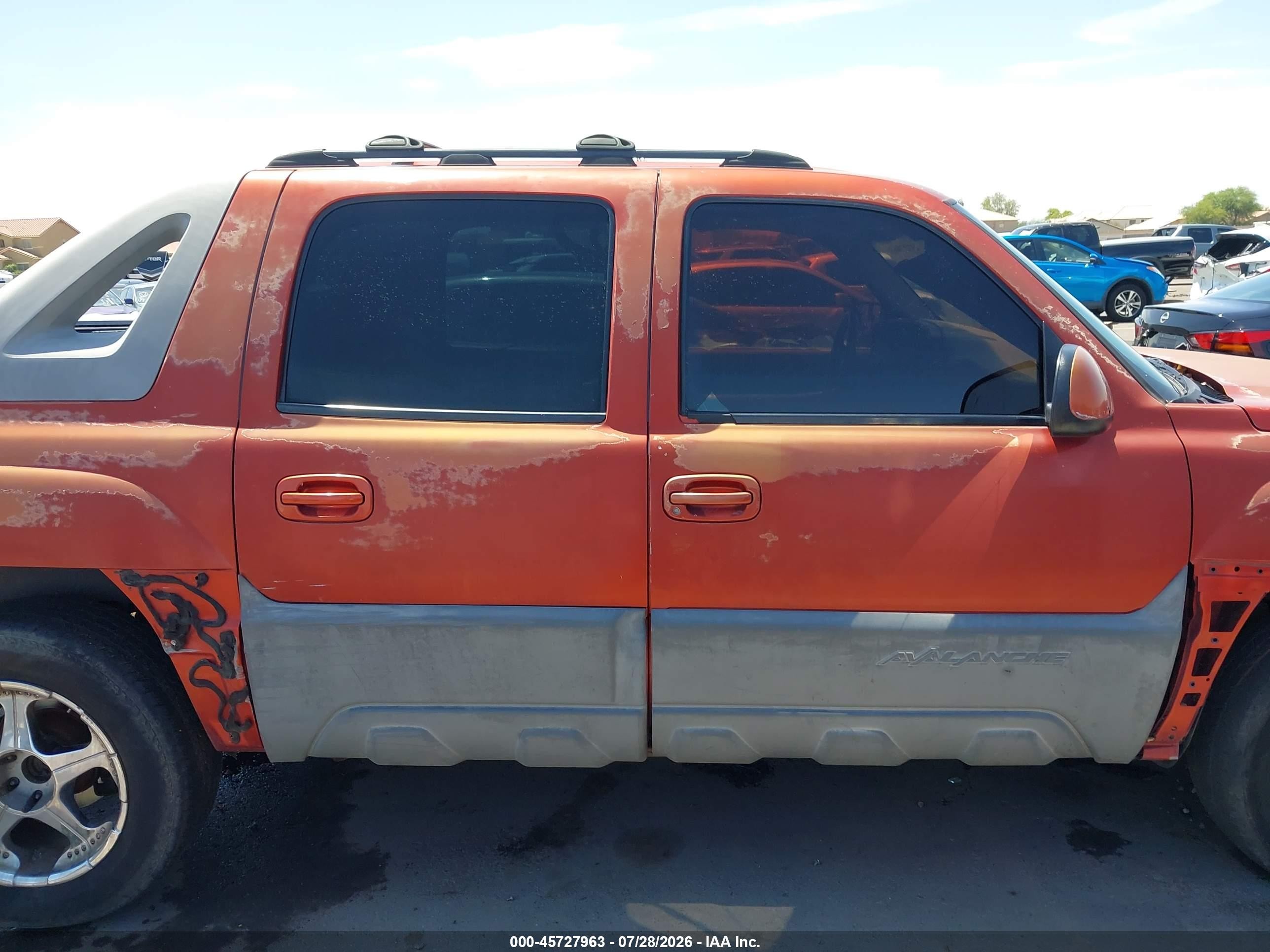 2002 Chevrolet Avalanche 1500   Orange vin: 3GNEC13T62G221777