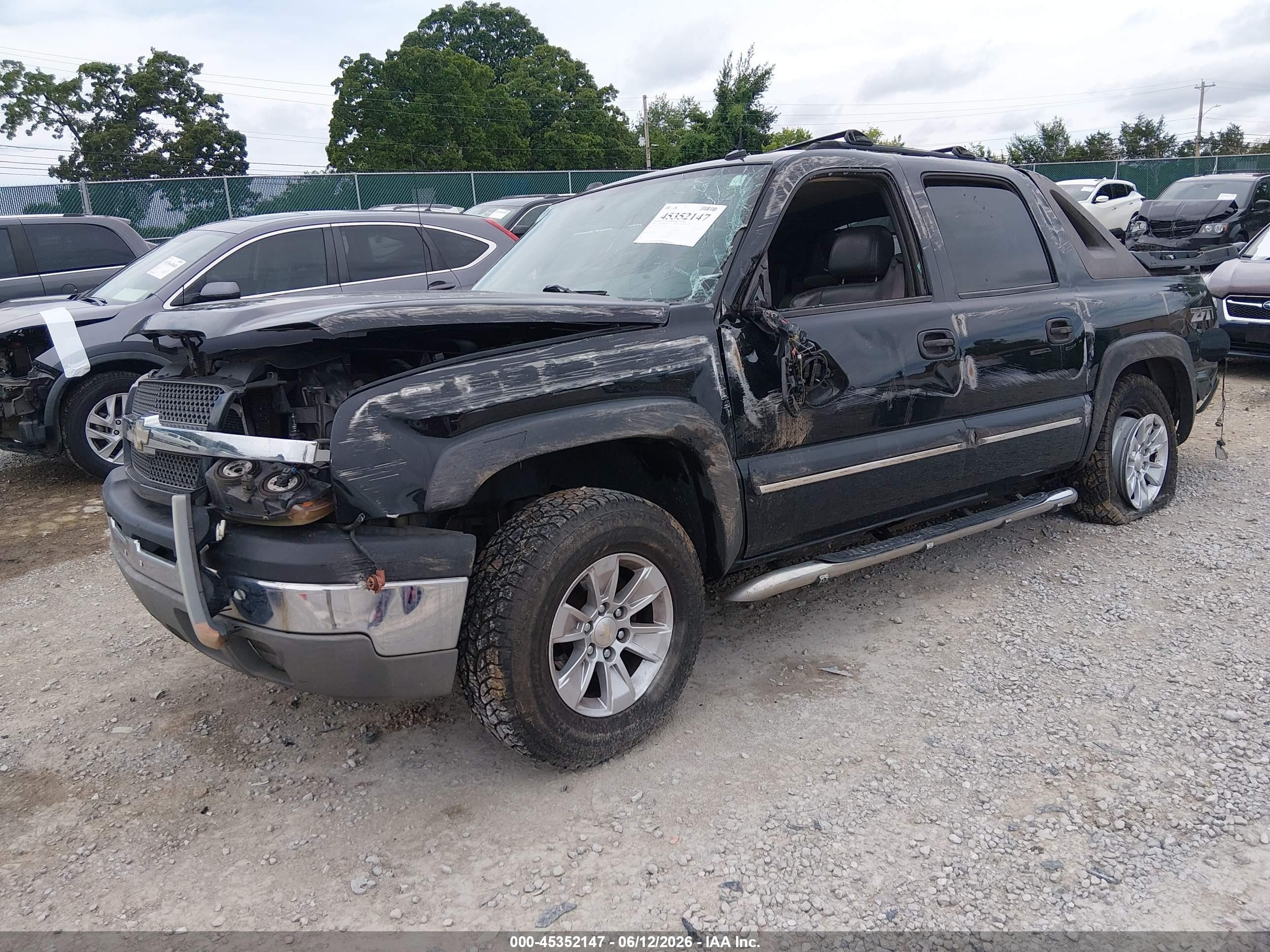 2004 Chevrolet Avalanche 1500   Black vin: 3GNEK12T84G114205