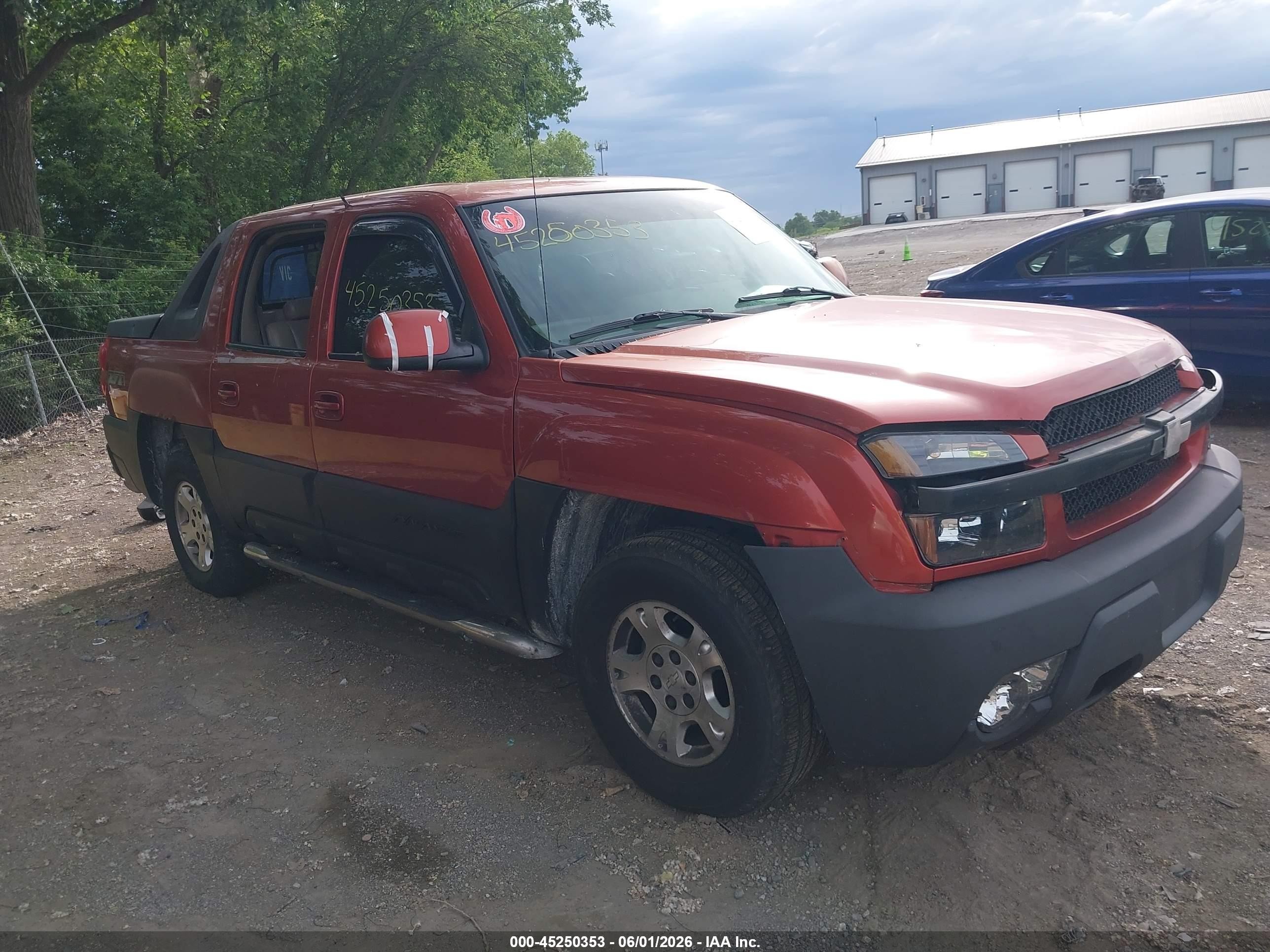 2003 Chevrolet Avalanche 1500   Orange vin: 3GNEK13T73G210128